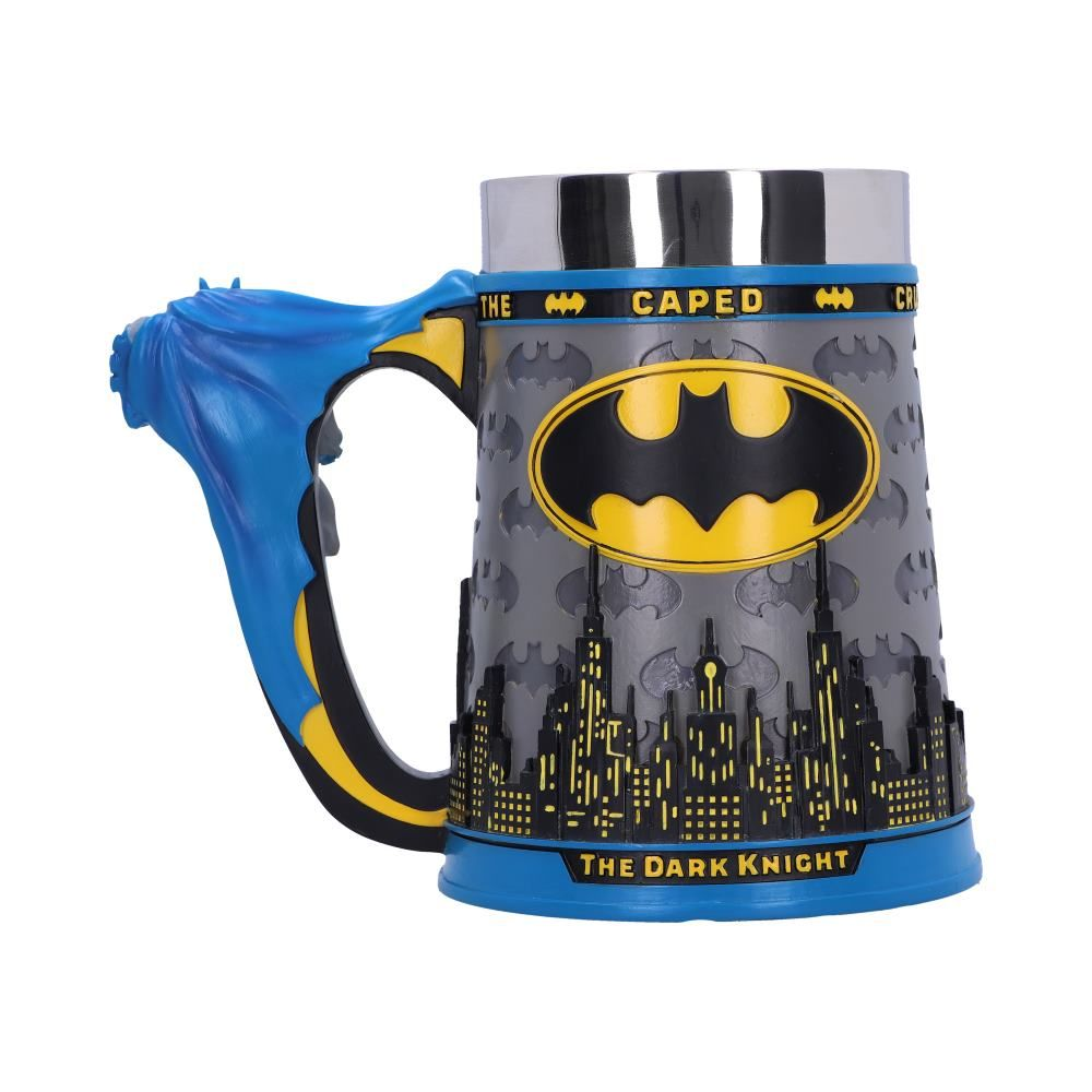 Batman mug with a blue handle and a cityscape design. Yellow Batman logo is on the front of the mug.