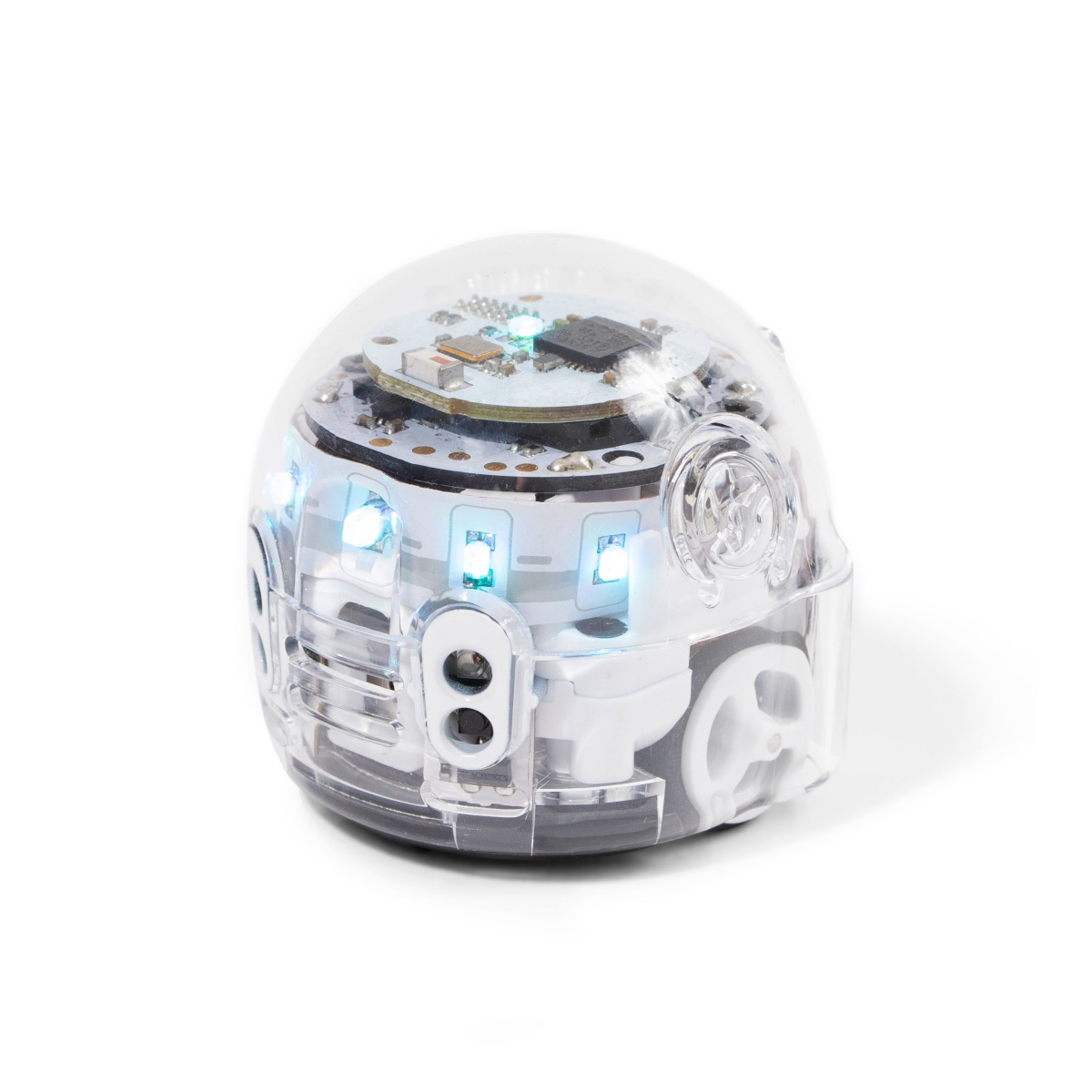 Clear robot toy with internal circuitry lit by blue lights, isolated on a white background.