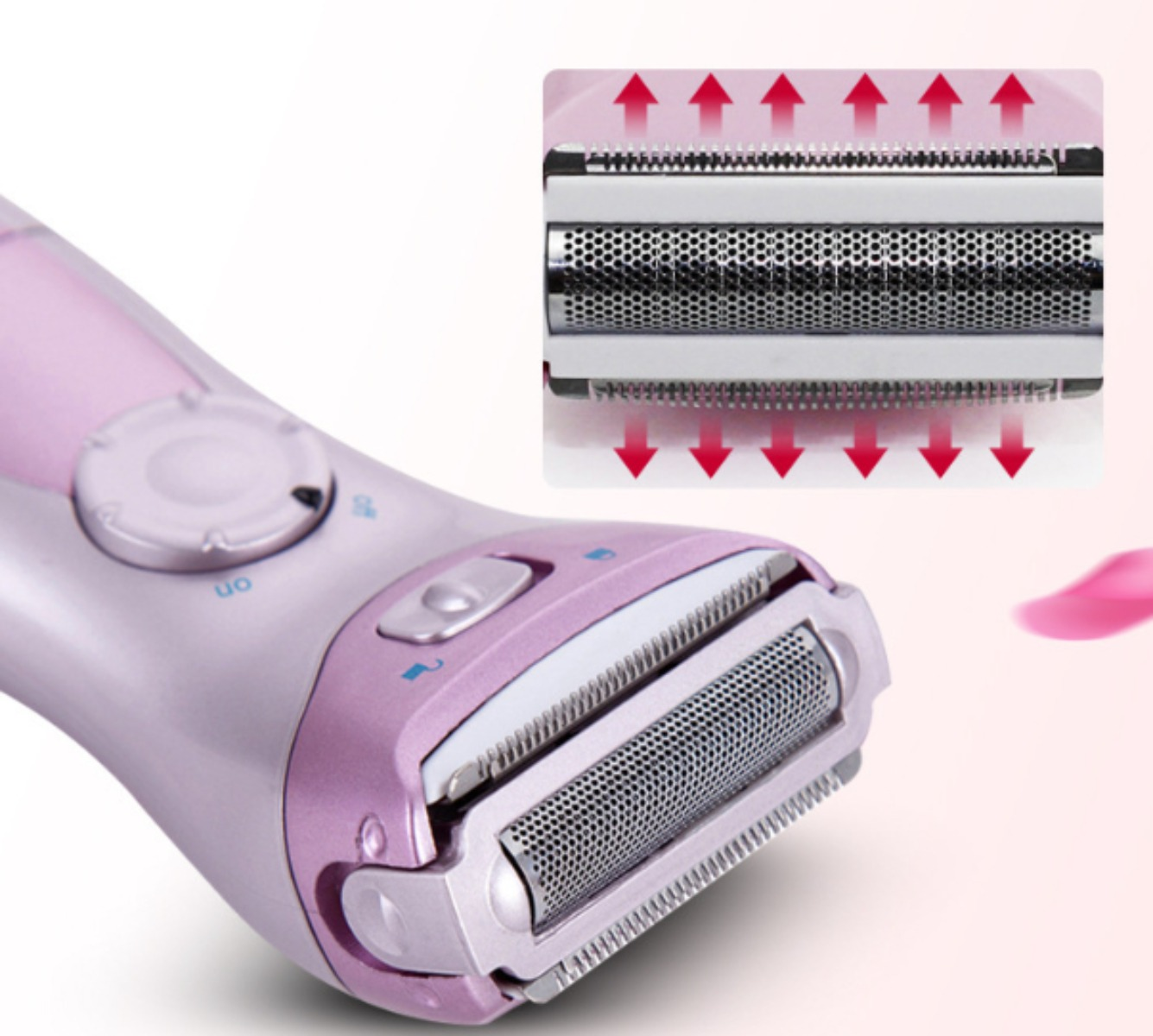 Nahaufnahme eines rosa-violetten Elektrorasierers, der die Klingen und einen Detailausschnitt zeigt.