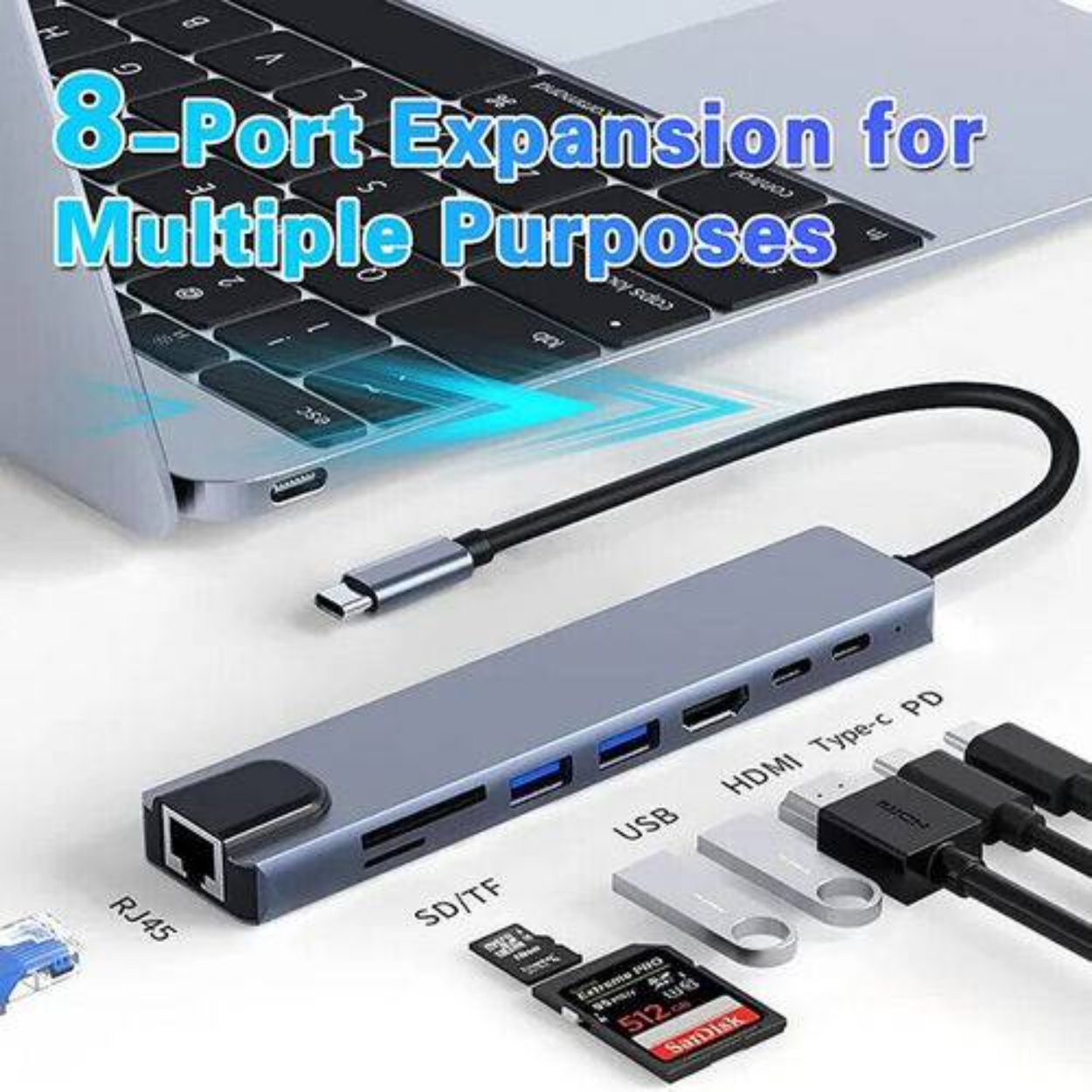 Laptop-Tastatur, 8-Port-Hub mit USB, HDMI und anderen Anschlüssen. Karten und Kabel sind verbunden.