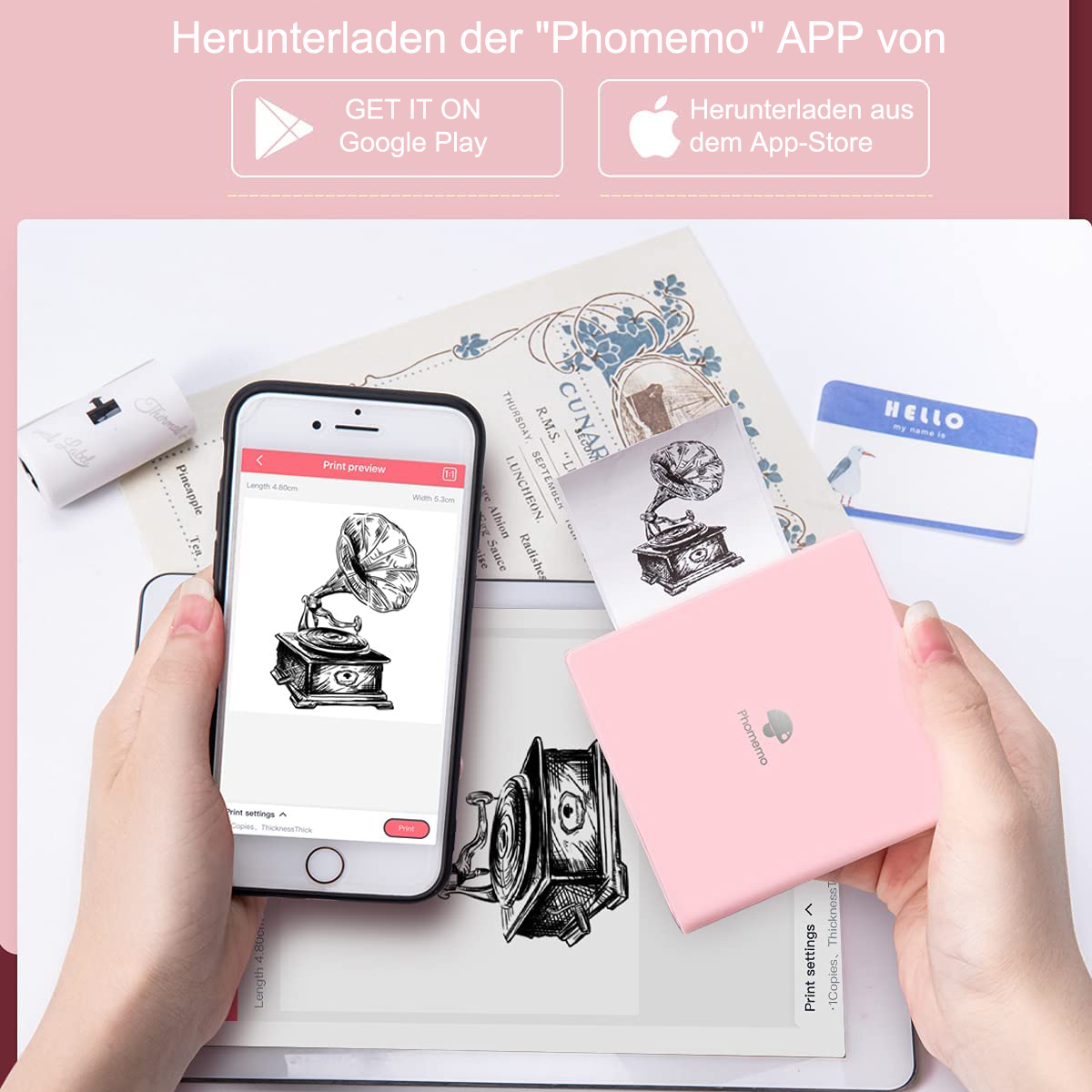 Ein rosa Etikettendrucker und ein Telefon, das ein Design auf einem Tablet zeigt.