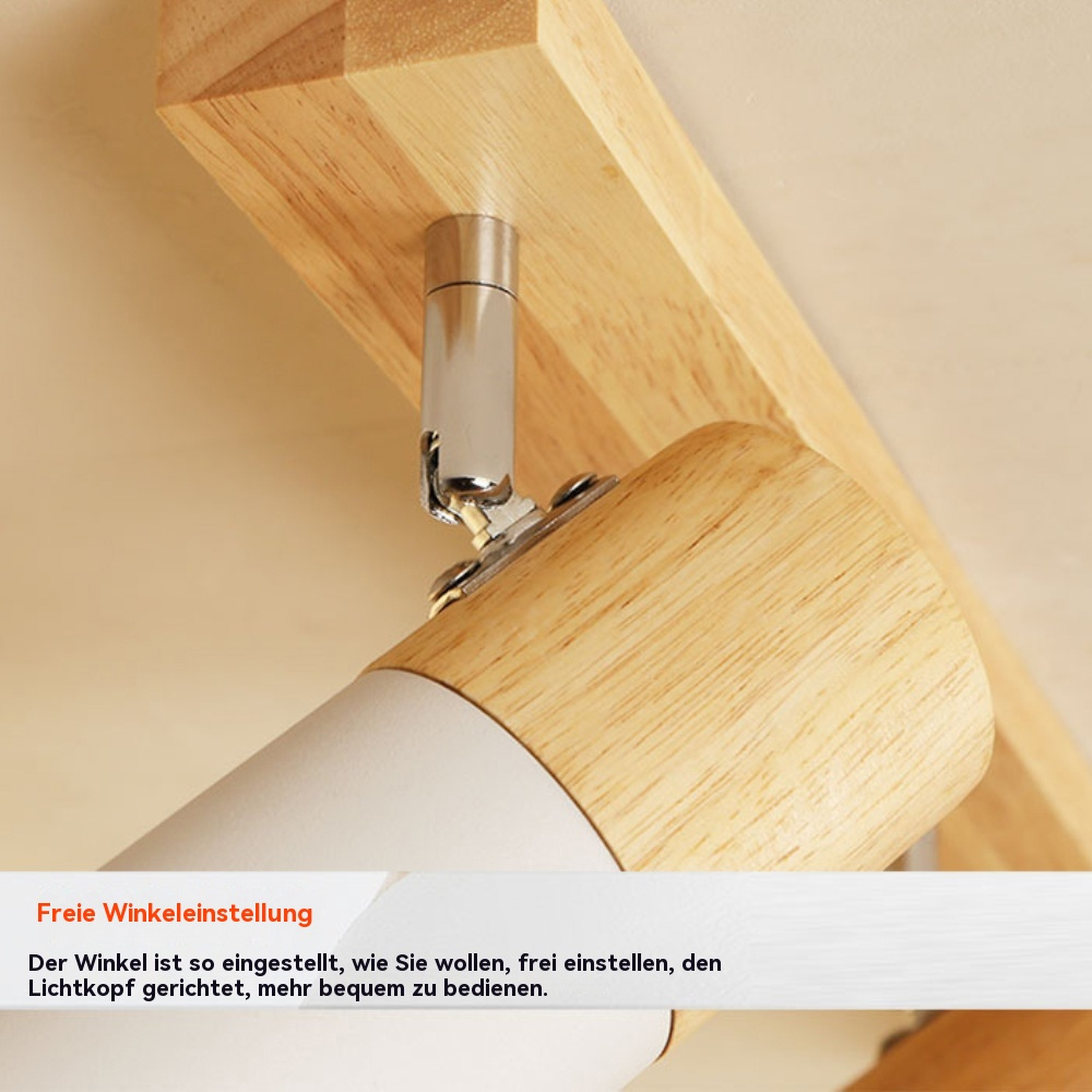 Holz- und weiße Scheinwerfer an einem Holzbalken montiert. Einstellbarer Winkel, Detailaufnahme.