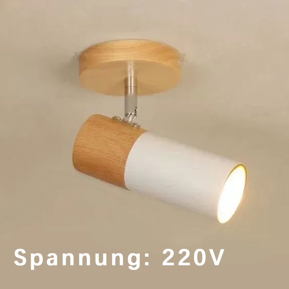Eine Deckenleuchte mit Holzaufsatz und weißem, zylindrischem Körper, der Licht aussendet.