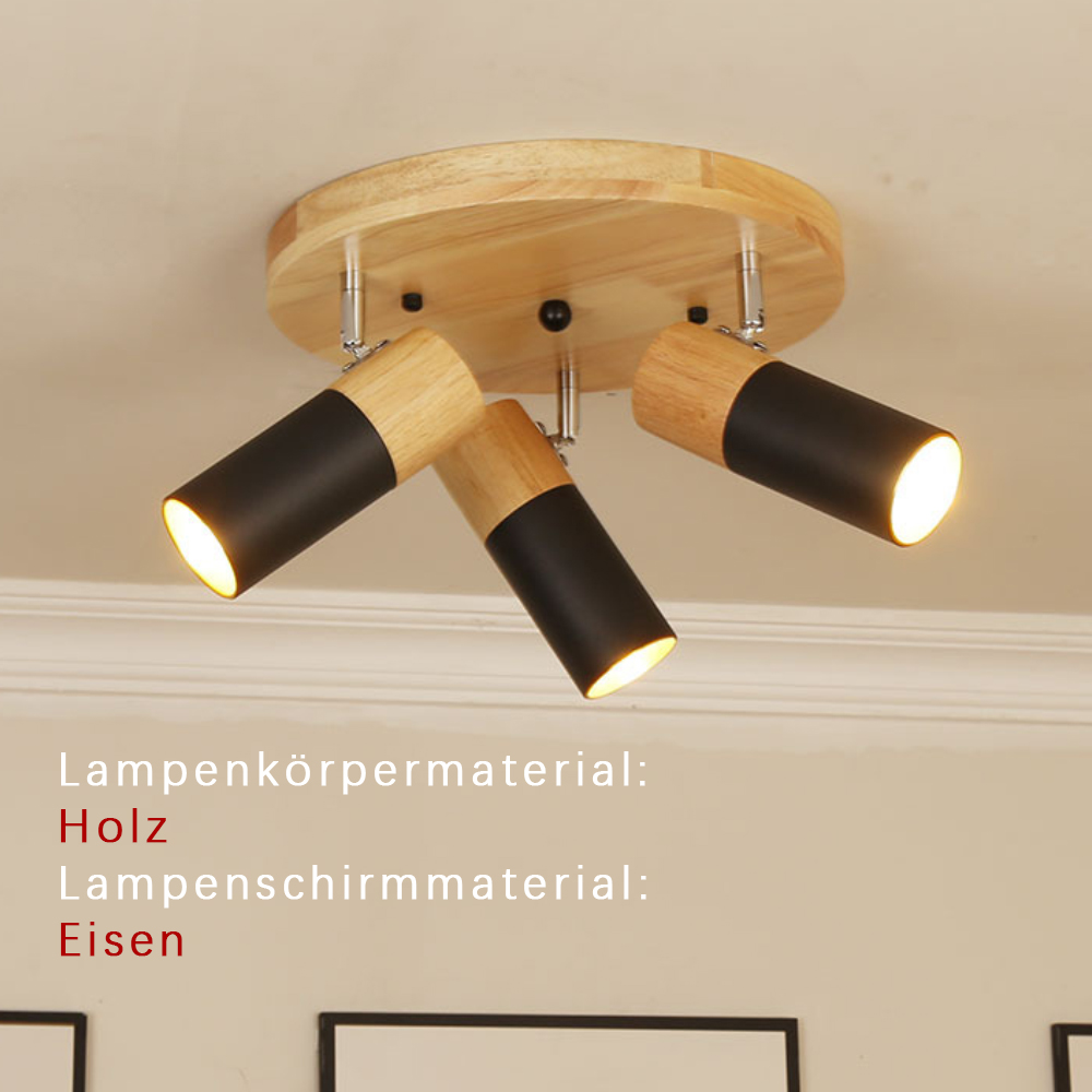 Deckenleuchte mit drei verstellbaren schwarzen und Holzlampen.