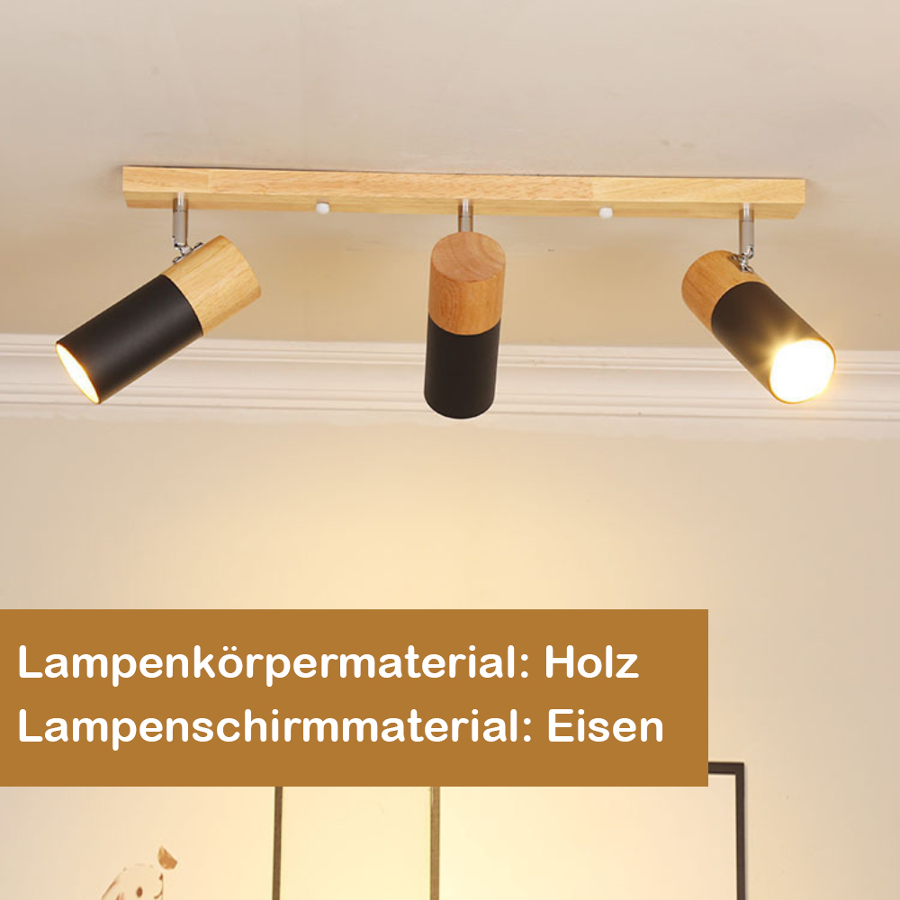 Deckenleuchten, Holz und Schwarz. Drei Strahler auf einem Holzbalken. Weiße Decke.