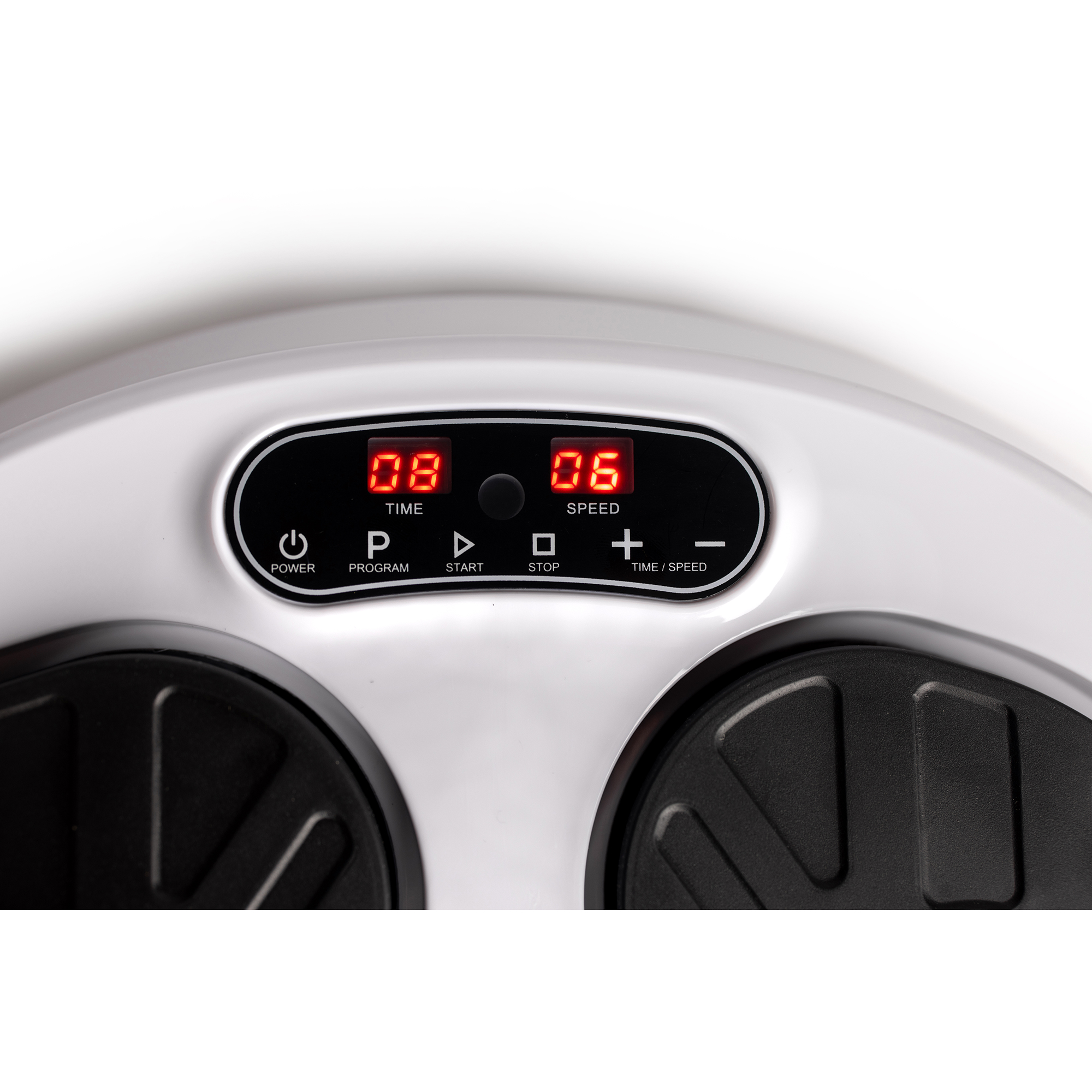 Close-up of a white fitness machine control panel. Displays time, speed, and buttons.