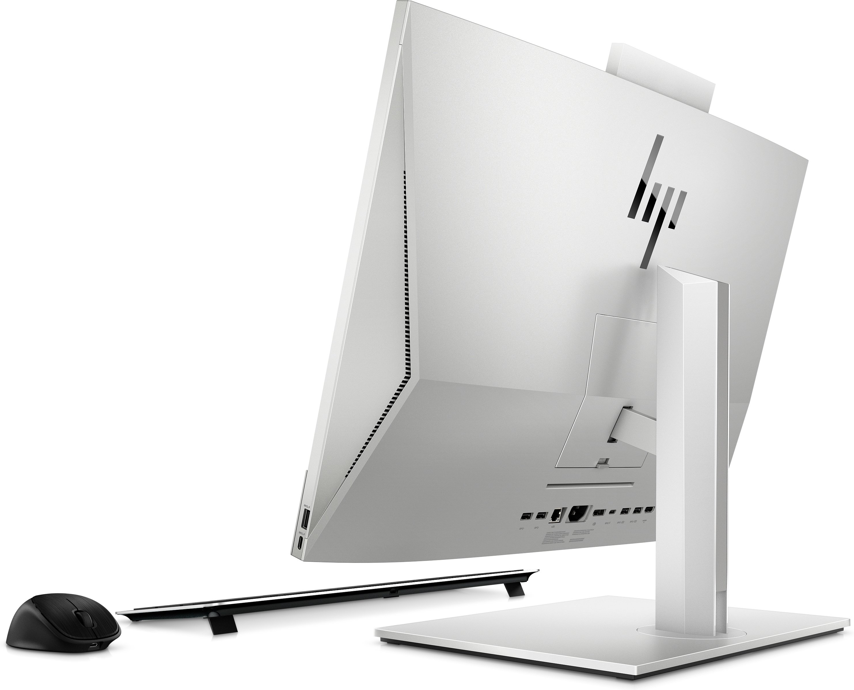 Computer HP all-in-one bianco, vista posteriore, con mouse e tastiera.
