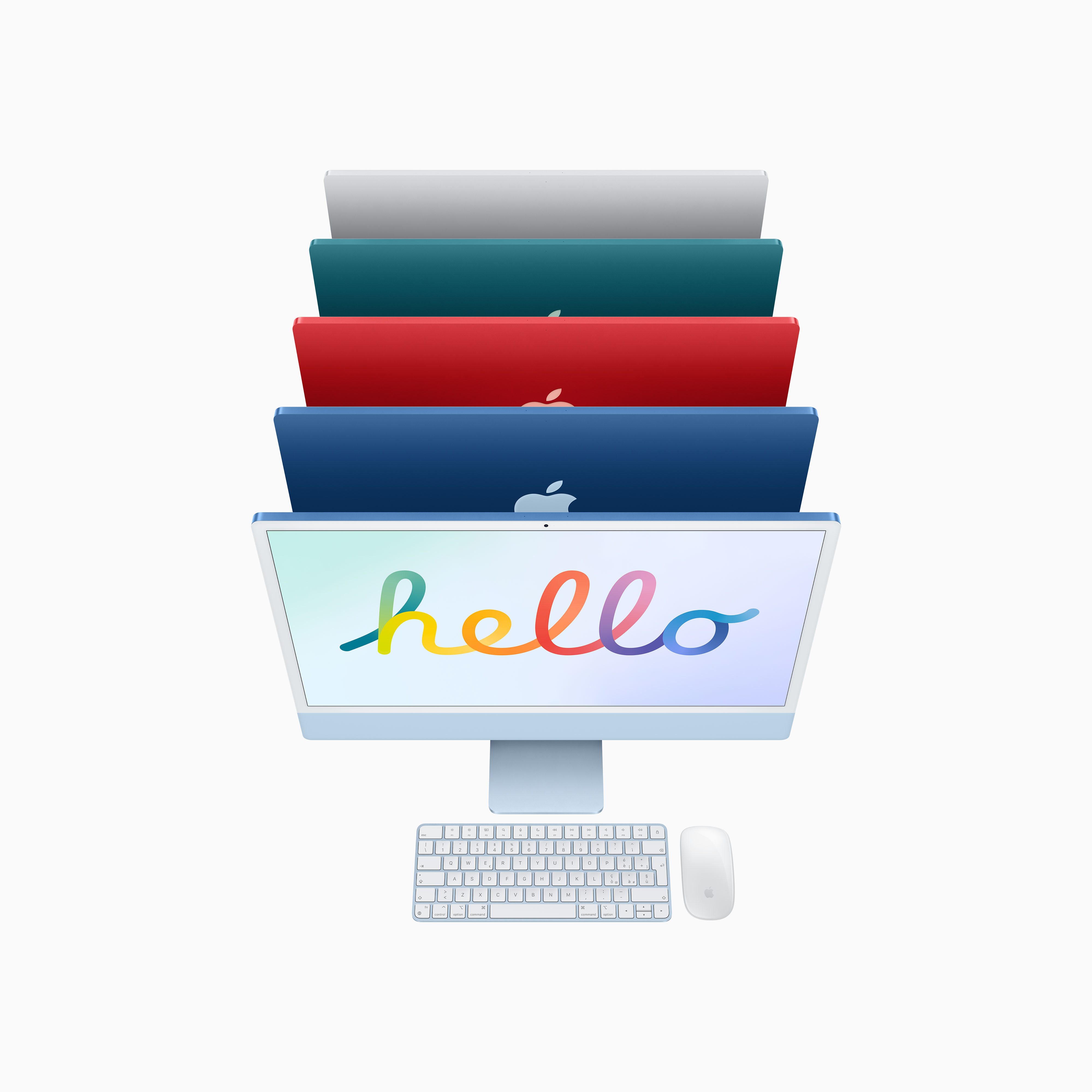 Stos kolorowych komputerów iMac ze słowem "hello" na wyświetlaczu. Klawiatura i mysz z przodu.
