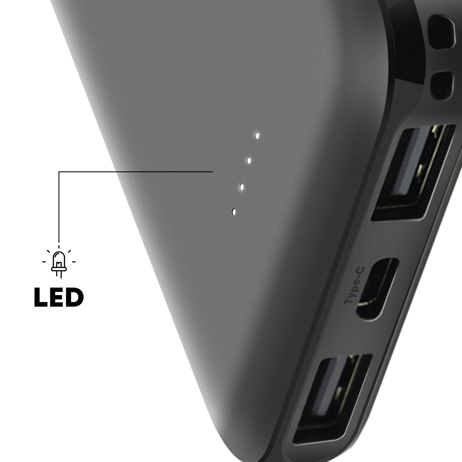 Primo piano di un power bank grigio scuro con indicatori LED e diverse porte USB.