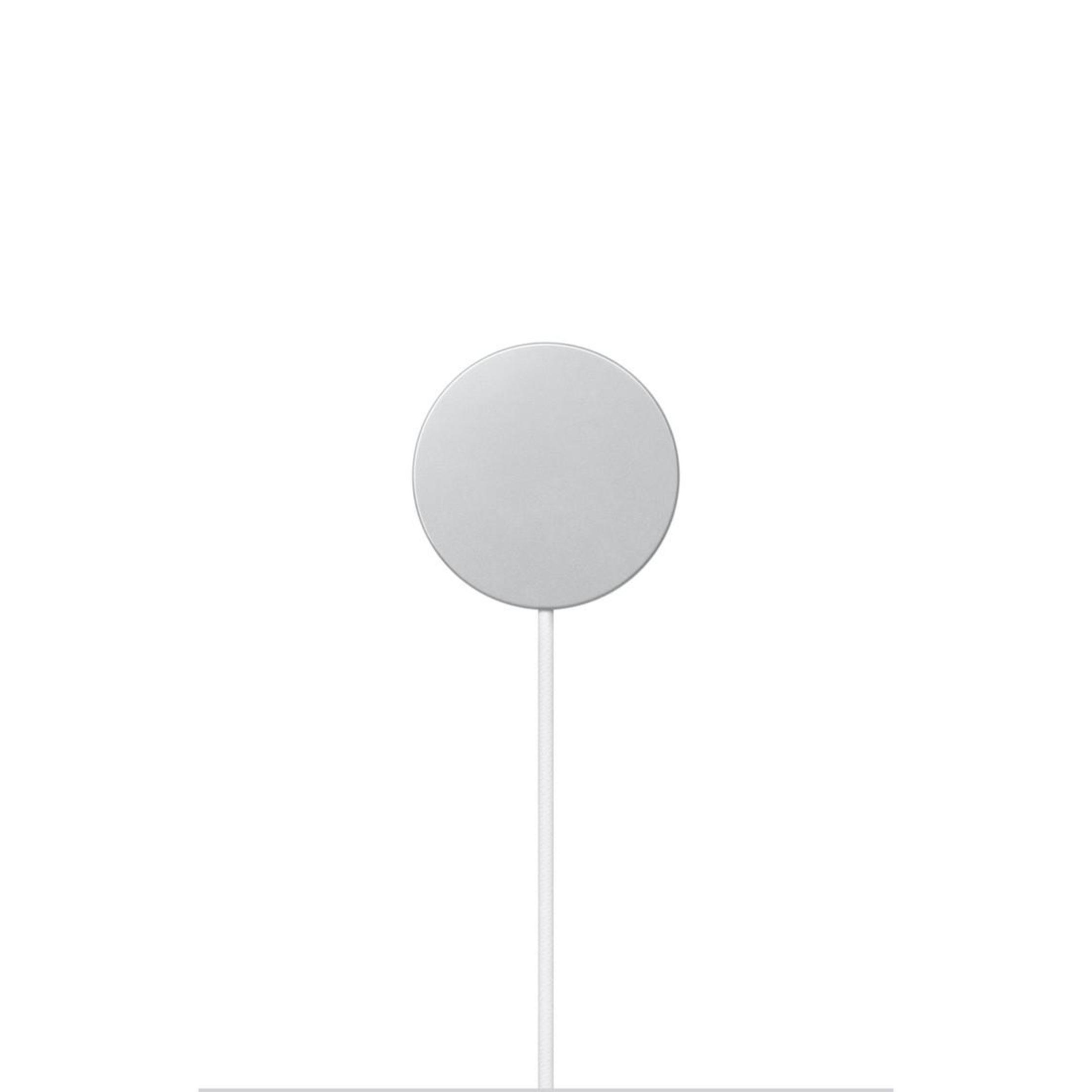 Chargeur rond blanc avec bord argenté et câble blanc.