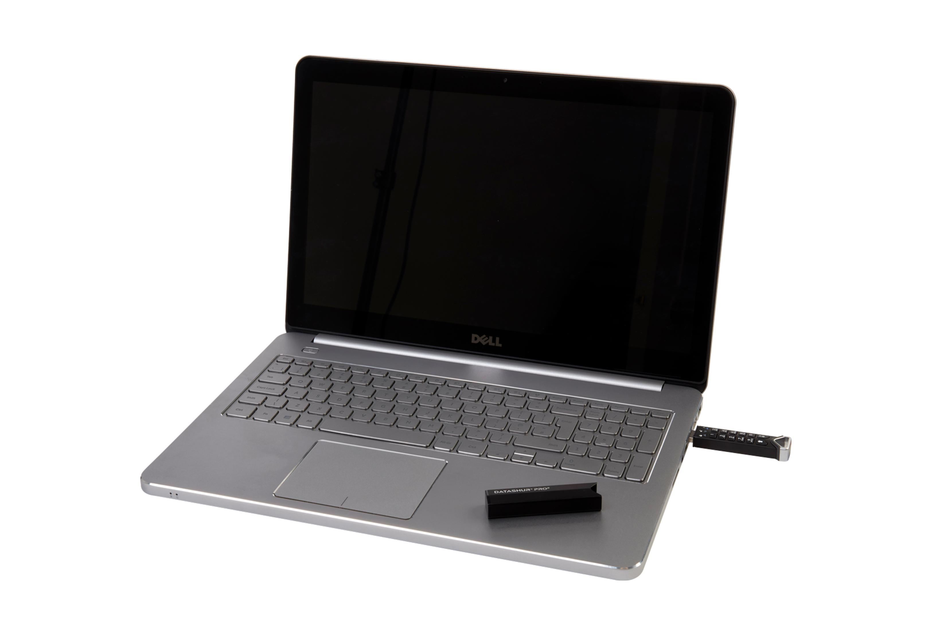 Ein silberner Laptop mit schwarzem Bildschirm und ein schwarzer USB-Stick.