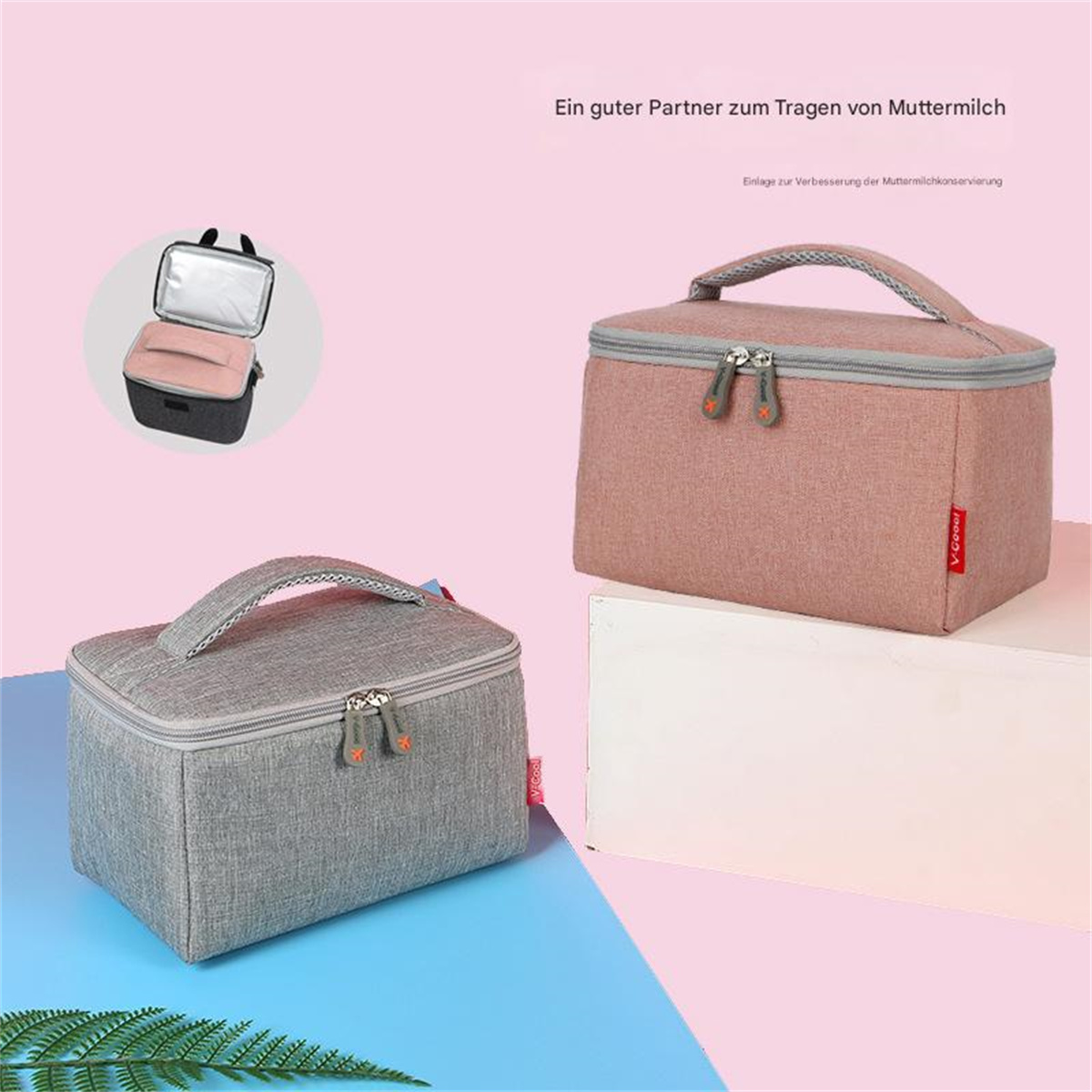 Zwei isolierte Lunch-Taschen, eine graue und eine rosa. Beide haben Griffe und Reißverschlüsse, vor rosa Hintergrund.
