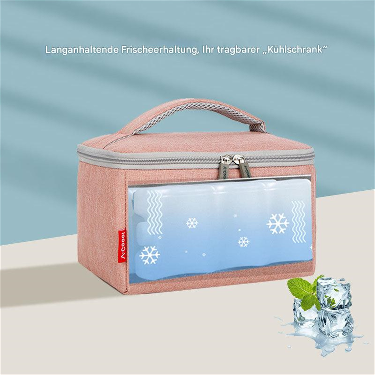 Rosa Kühltasche mit Fenster. Zeigt ein blaues Kühlpack mit Schneeflocken. Minzblätter.