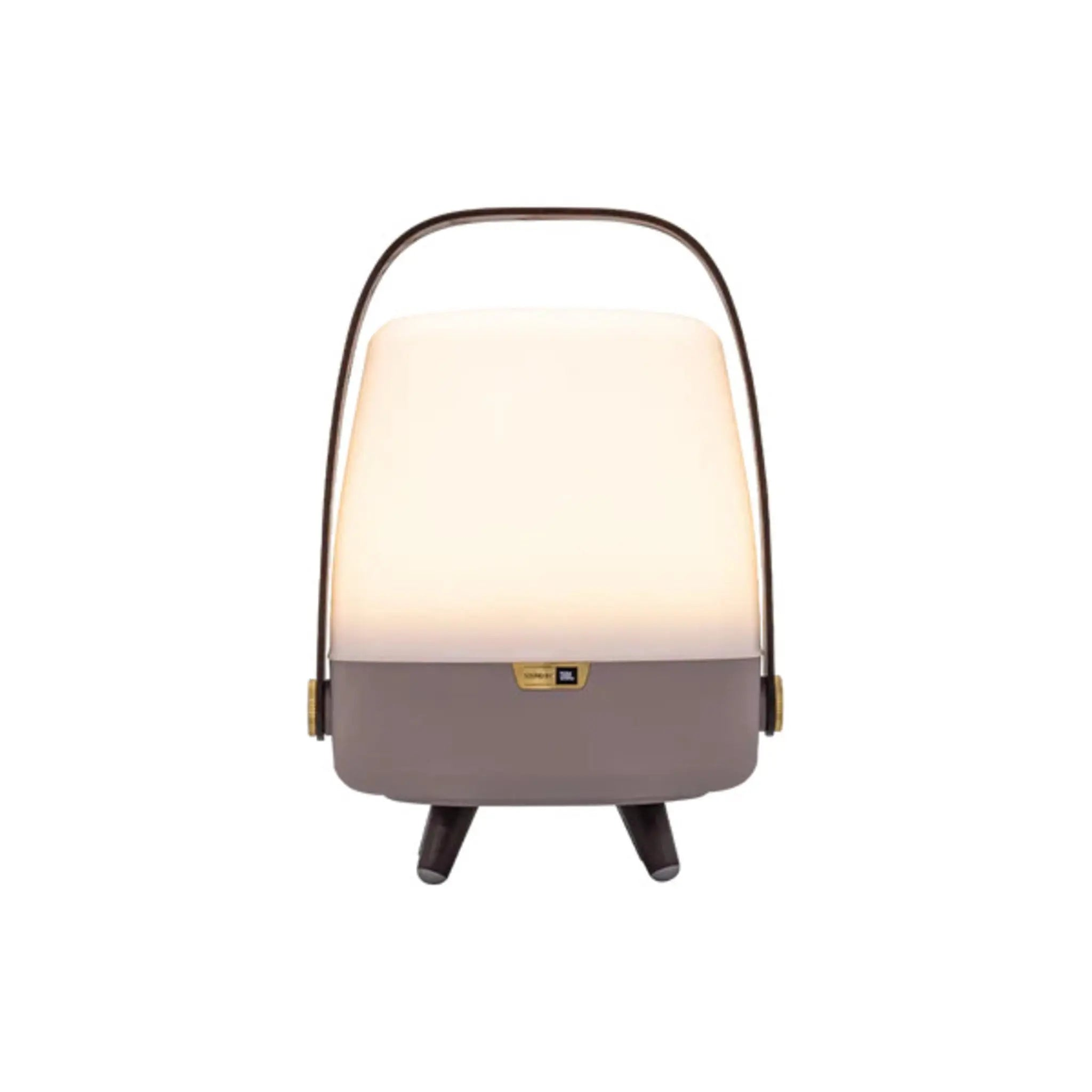 Eine weiße und graue Nachttischlampe mit Griff. Sie steht auf drei kurzen Beinen.