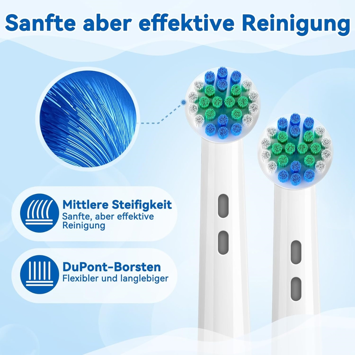 Zwei weiße Zahnbürstenköpfe mit blauen und grünen Borsten, mit deutschem Text.