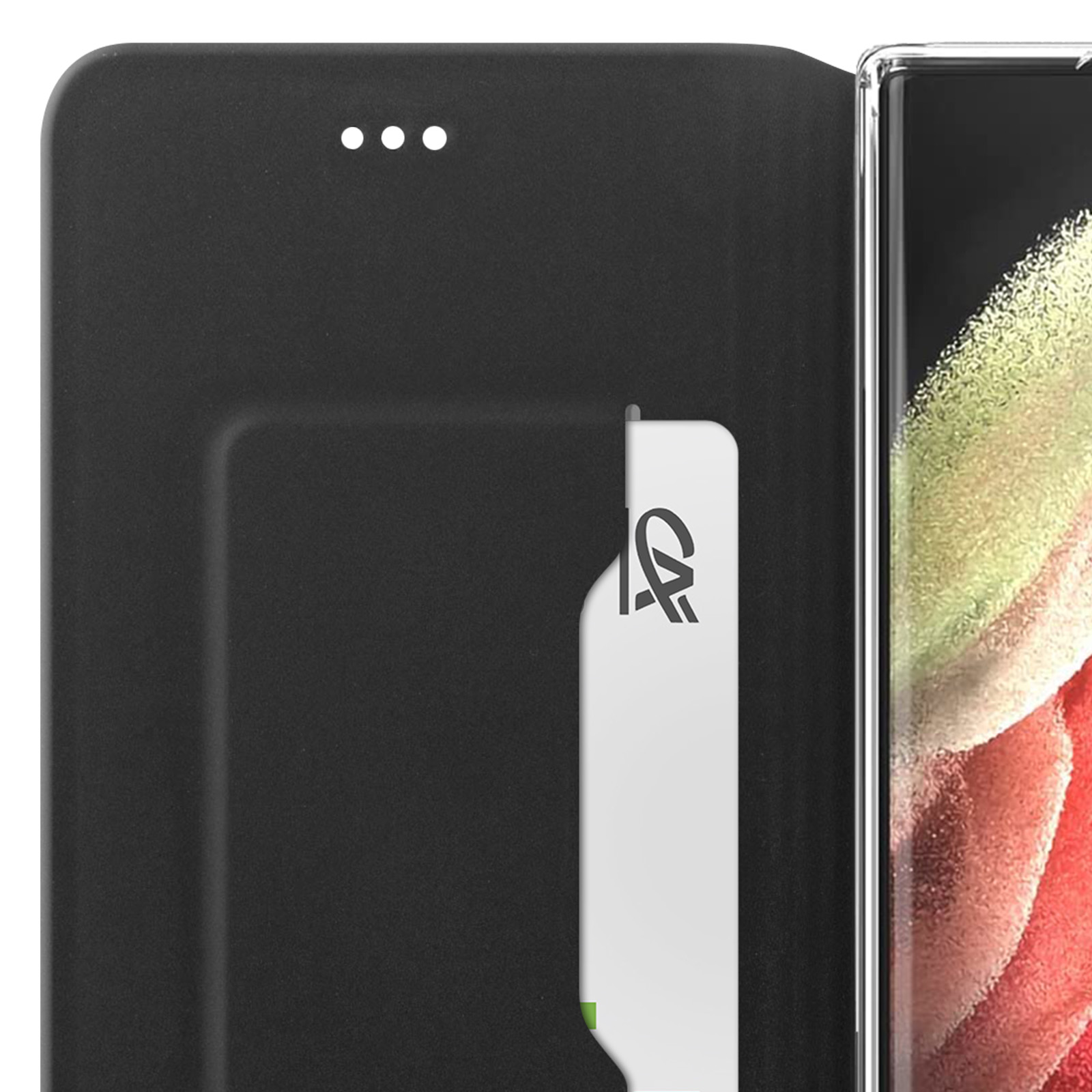 Custodia nera per telefono con slot per schede. Un telefono è parzialmente visibile. Scheda bianca all'interno.