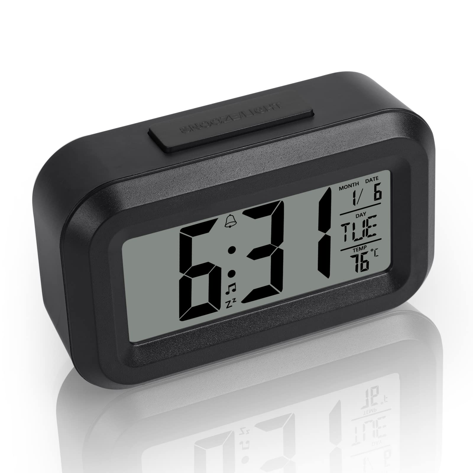 Ein schwarzer digitaler Wecker, der Zeit, Datum und Temperatur anzeigt. Knöpfe und Display sichtbar.