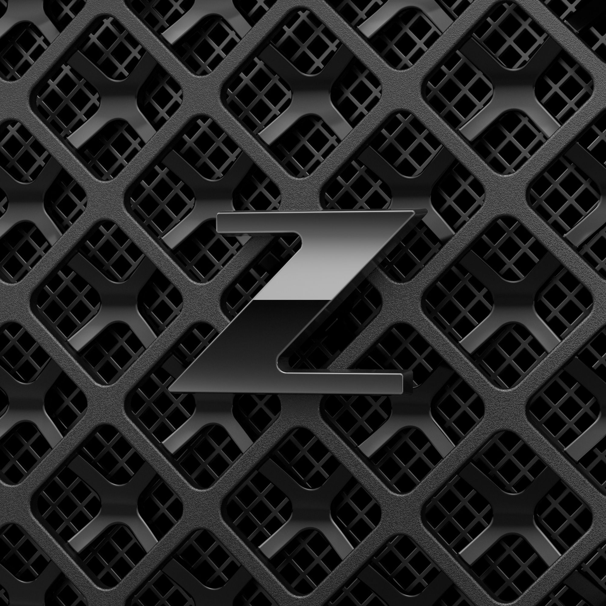 Czarny grill z chromowanym logo 'Z' pośrodku, wzór w romby.