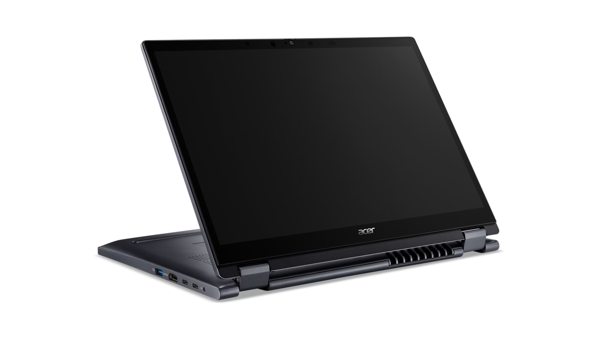 Laptop z częściowo otwartym ekranem, pokazujący ciemny wyświetlacz. Laptop znajduje się na białej powierzchni.