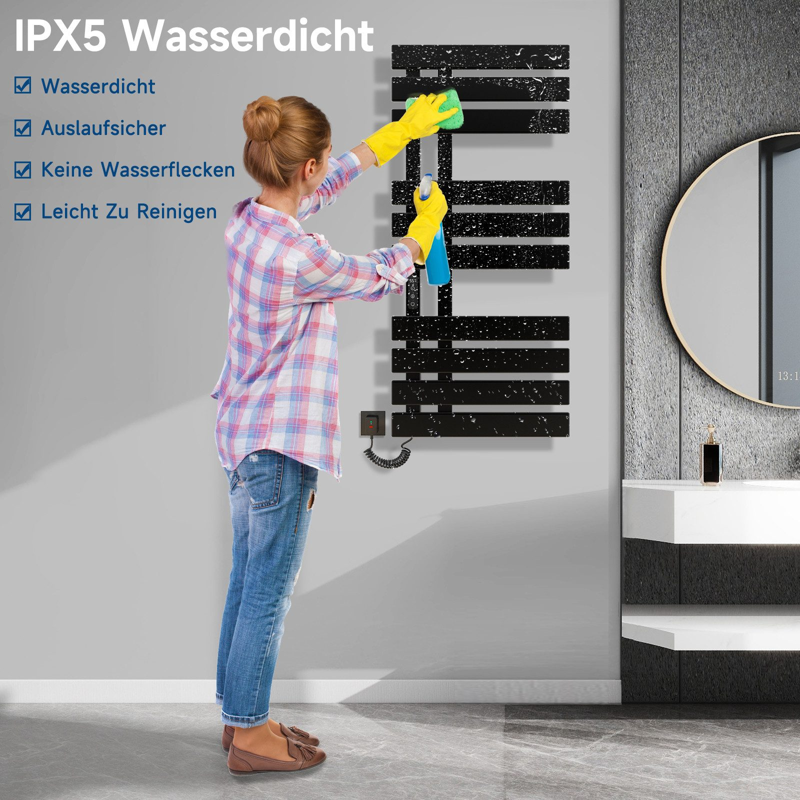 Frau reinigt einen schwarzen, modernen Handtuchwärmer. Badezimmer, grau und weiß.