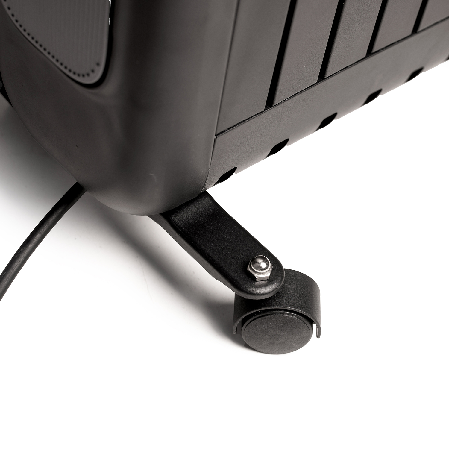 Black electric heater with wheels and a power cord against a white backdrop.