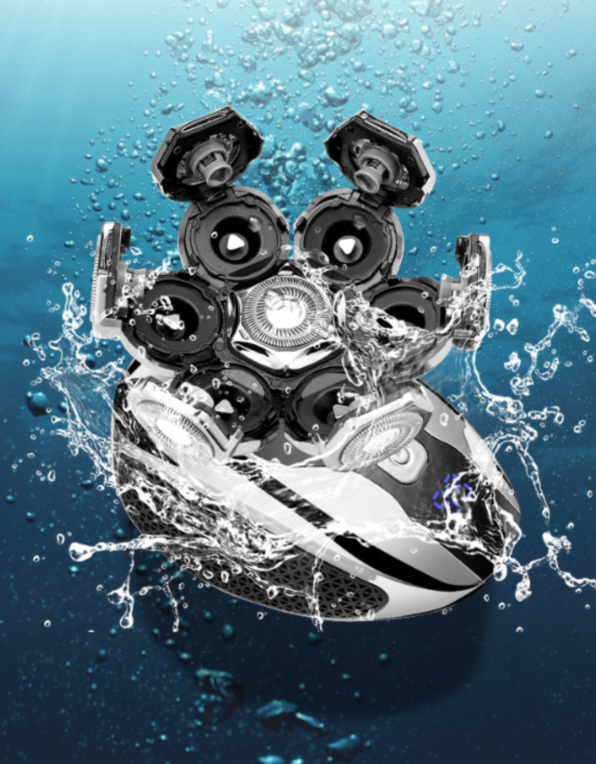 Ein elektrischer Rasierer unter Wasser mit spritzendem Wasser, das die Klingen zeigt.