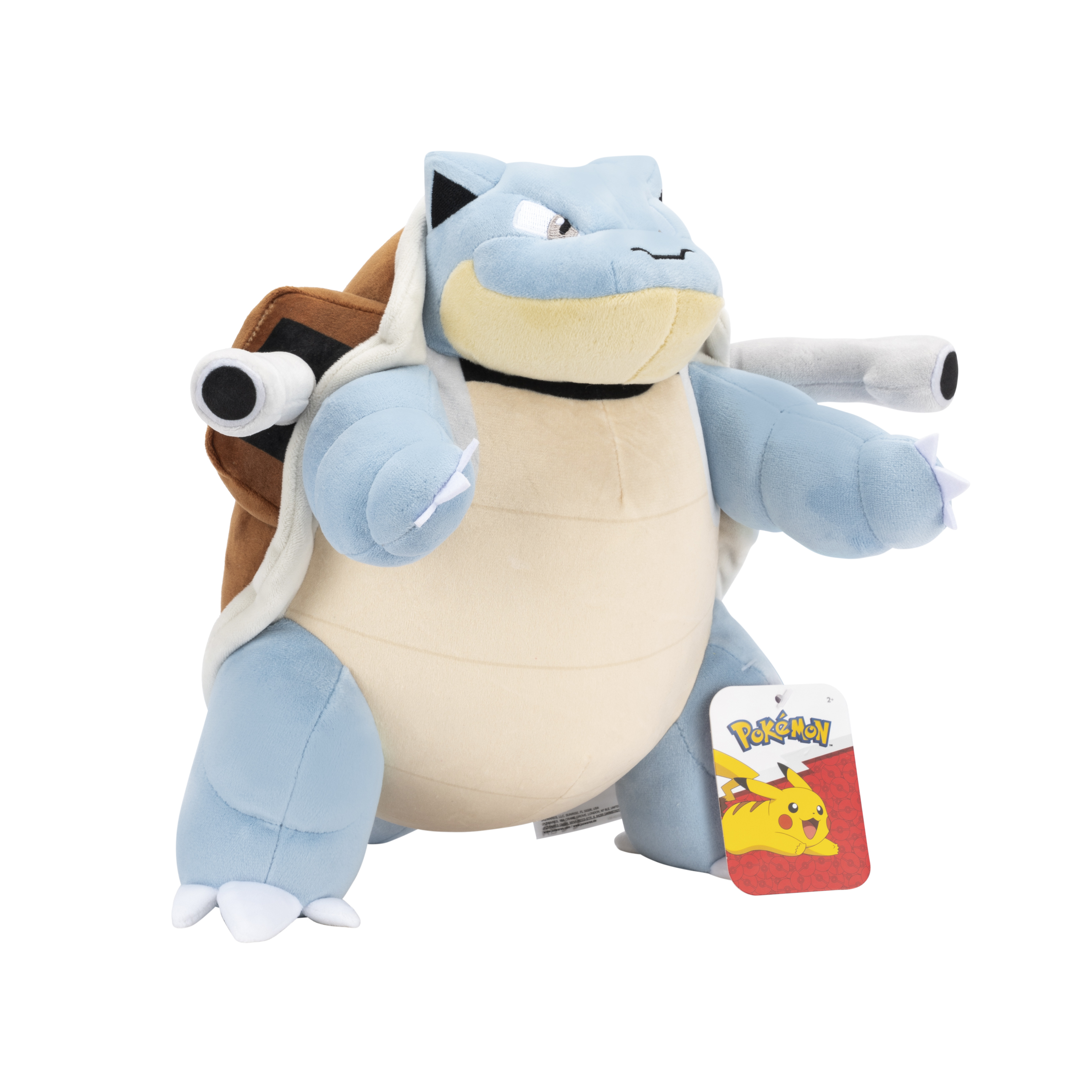 Une peluche Blastoise bleue avec une carapace marron, sur une surface blanche, avec une étiquette Pokémon.