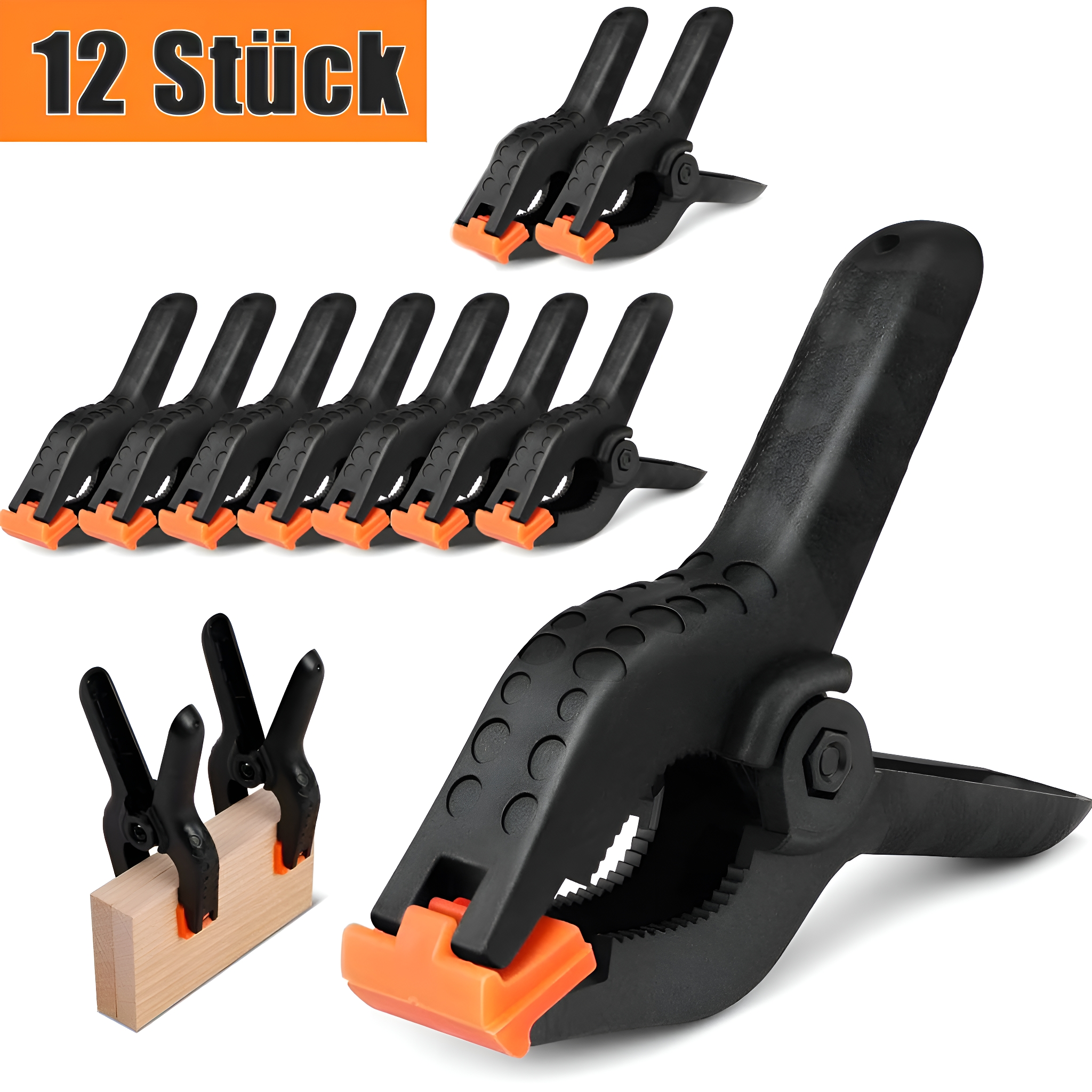 Schwarze und orangefarbene Klemmen in einem Stapel und auf Holz verwendet. Text: 12 Stück.
