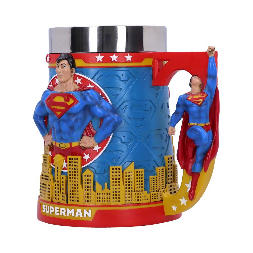 Superman mug with Superman figures and cityscape design. A red and yellow color scheme.