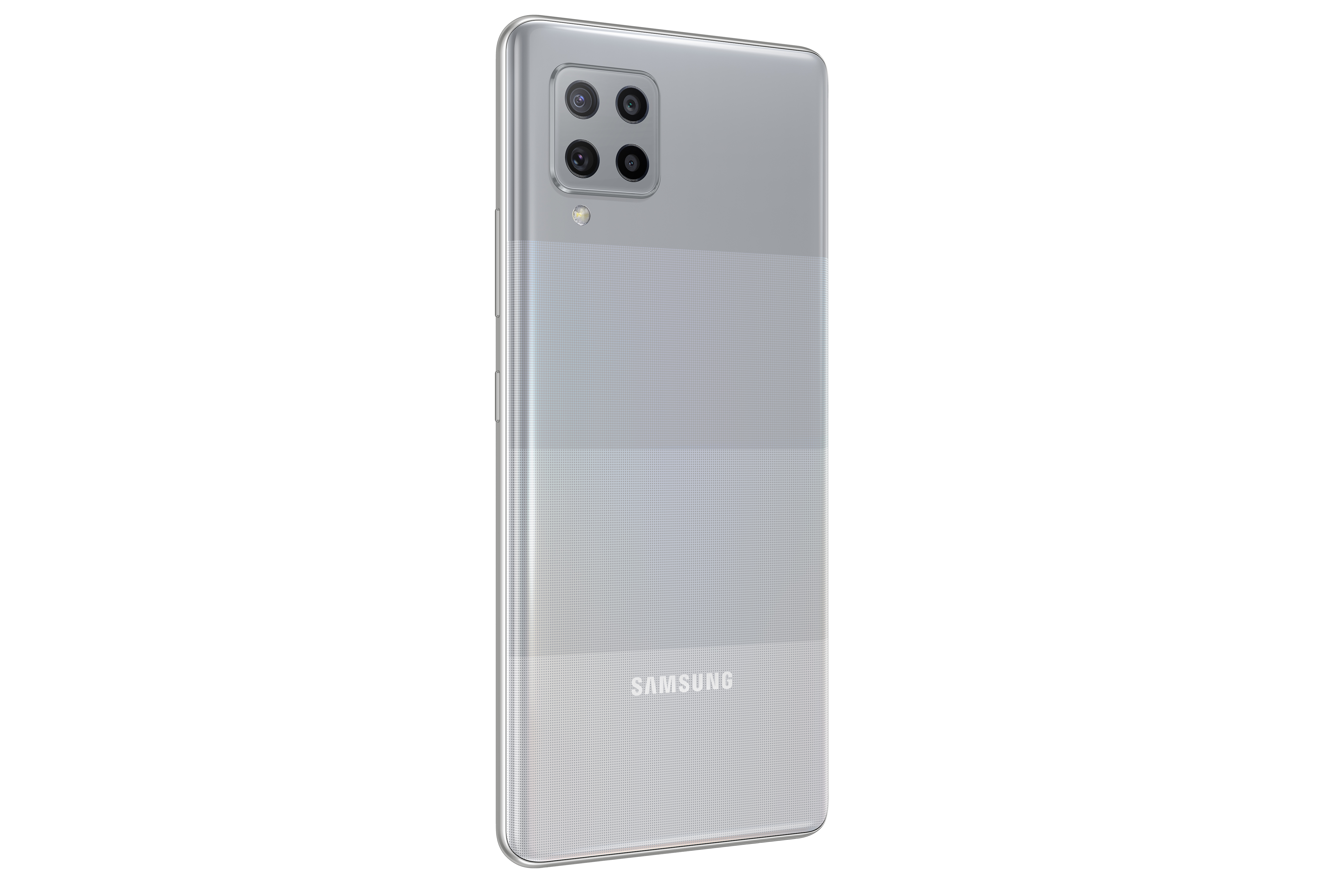Telefono argento con sistema multi-obiettivo sul retro, logo Samsung visibile.