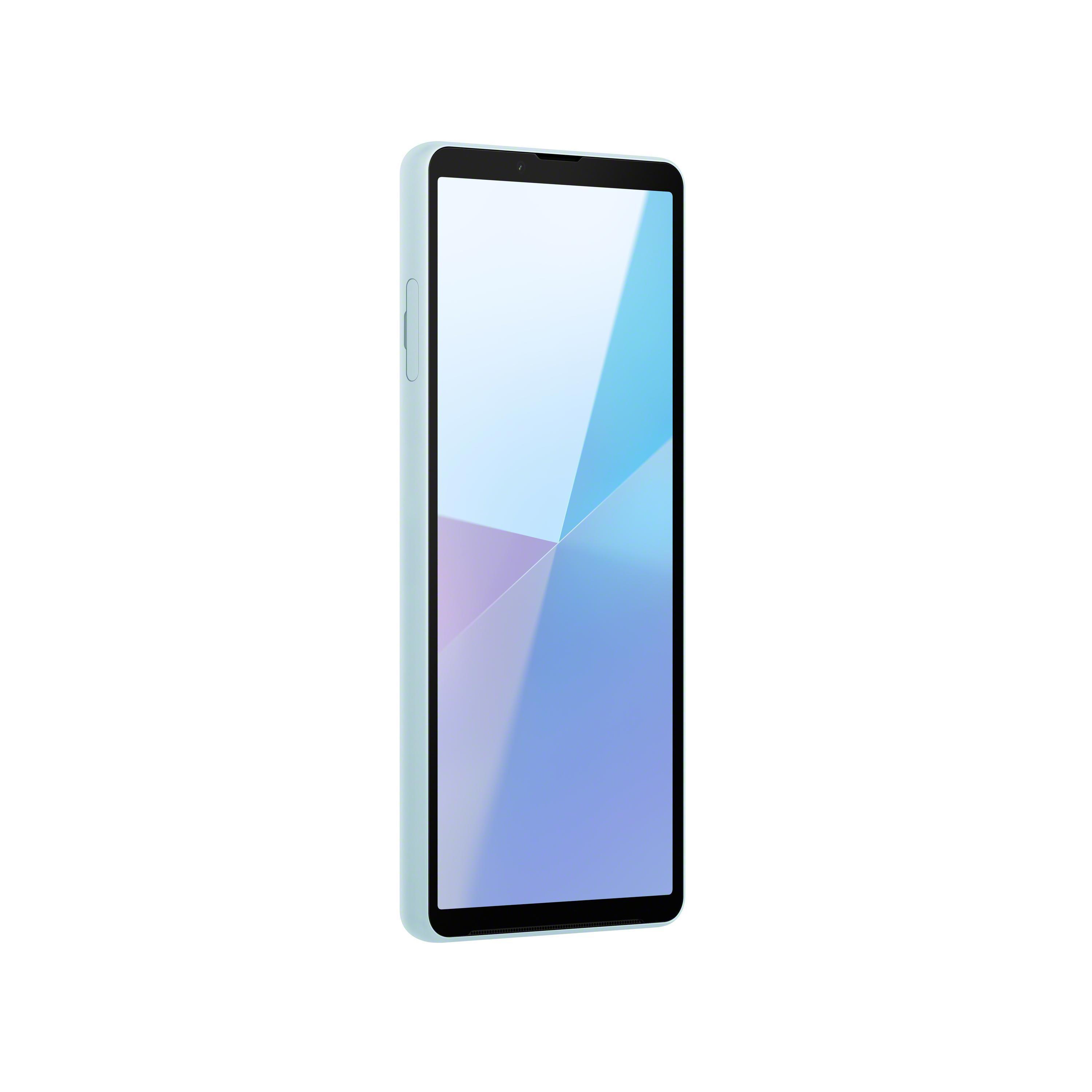 Telefono azzurro con schermo sfumato. Il telefono è su sfondo bianco.