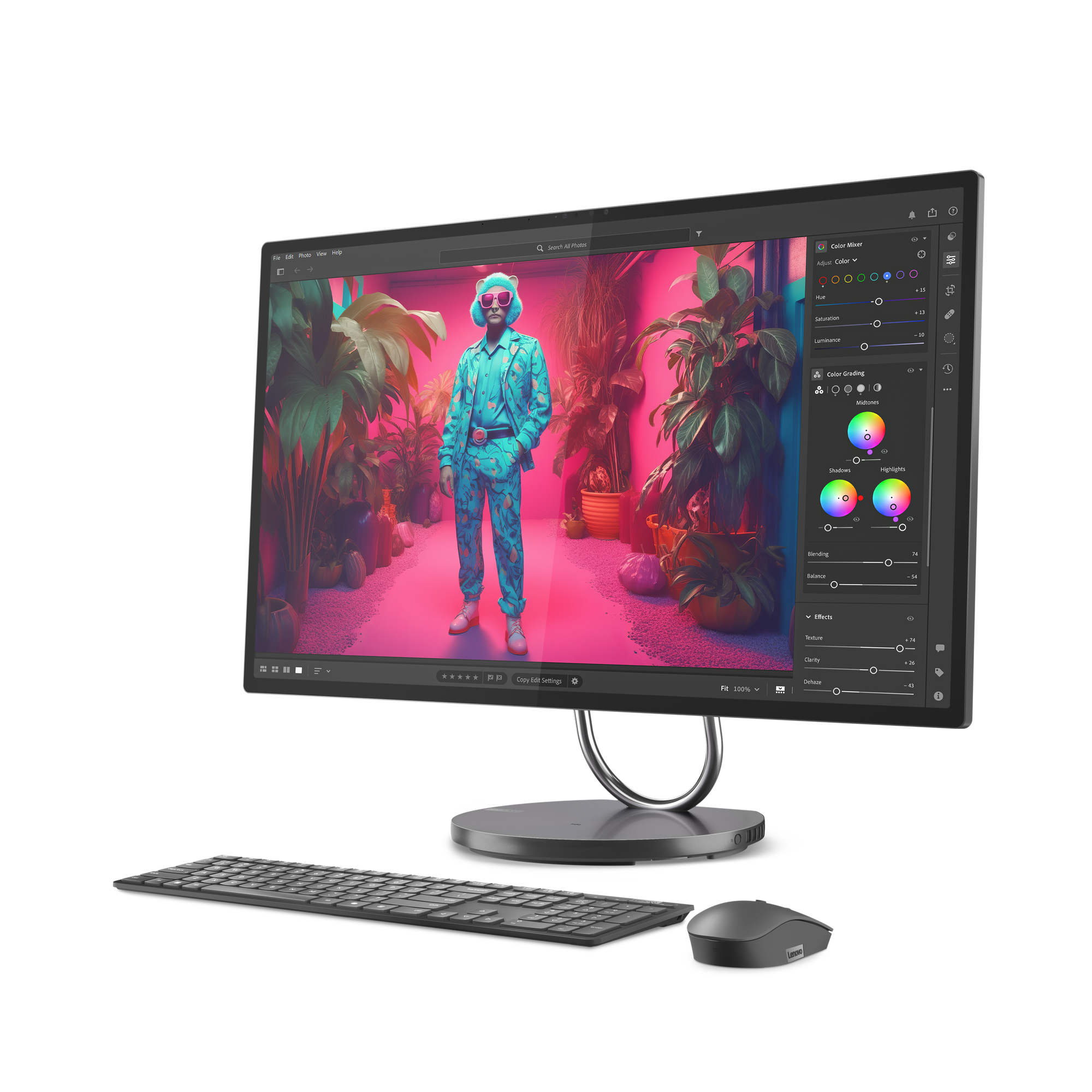 Komputer Lenovo all-in-one z klawiaturą i myszą. Ekran wyświetla interfejs edycji zdjęć.