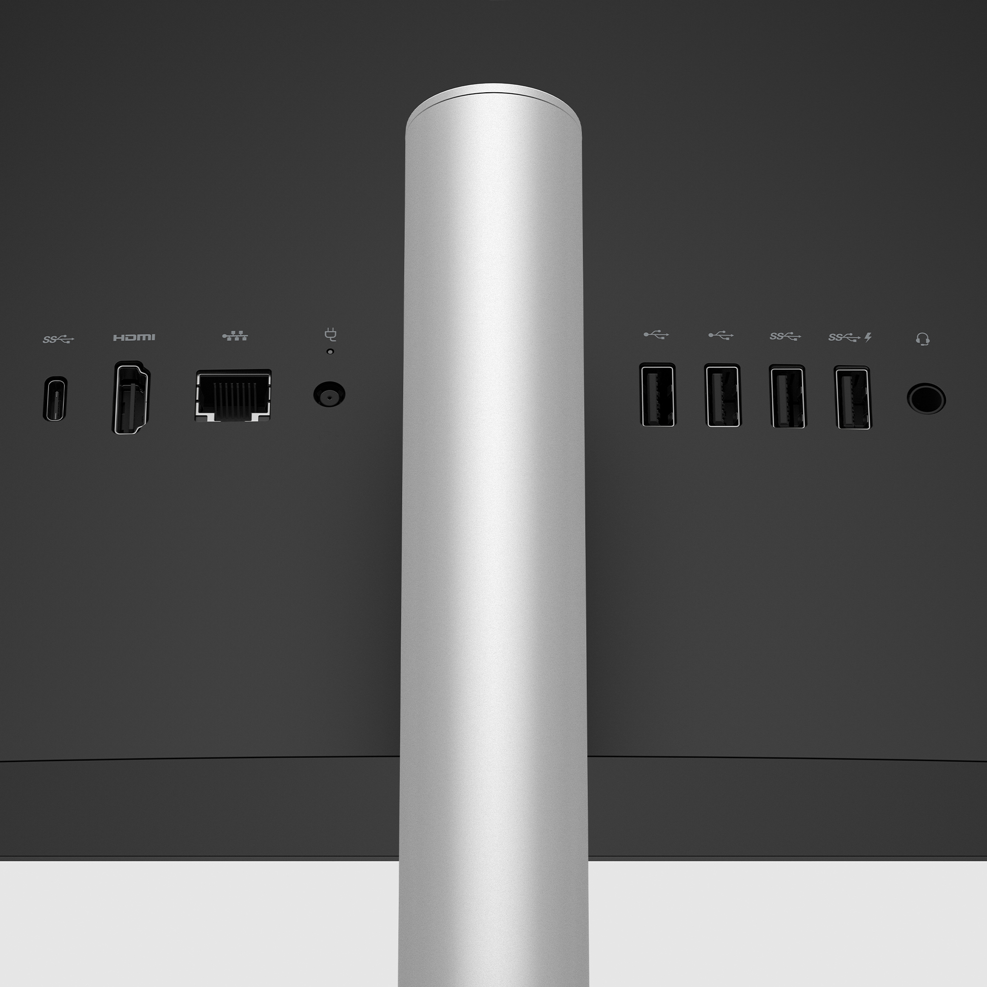 Zbliżenie portów z tyłu czarnego komputera All-in-One HP.