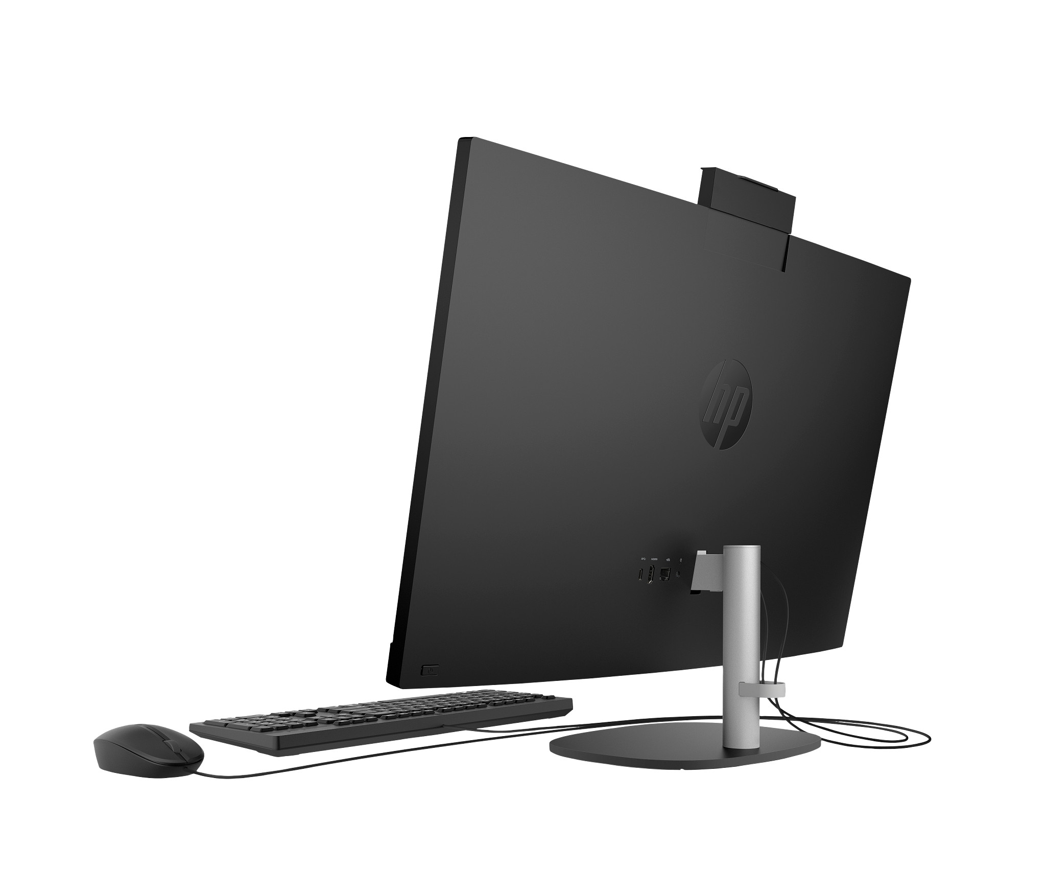 Czarny komputer HP all-in-one, widok z tyłu. Widoczne klawiatura, mysz i porty.