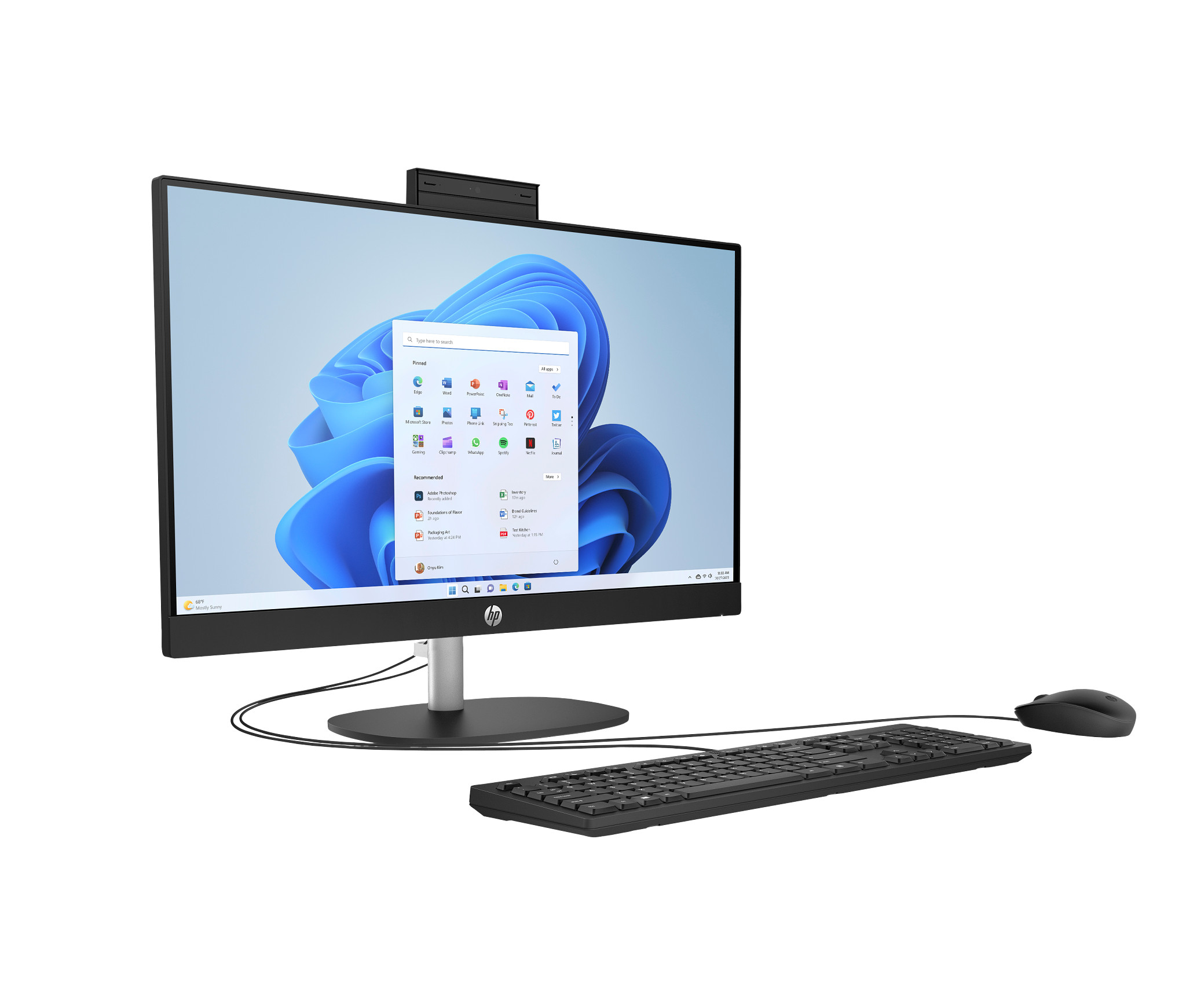 Komputer HP all-in-one pokazujący interfejs na ekranie, z klawiaturą i myszą.