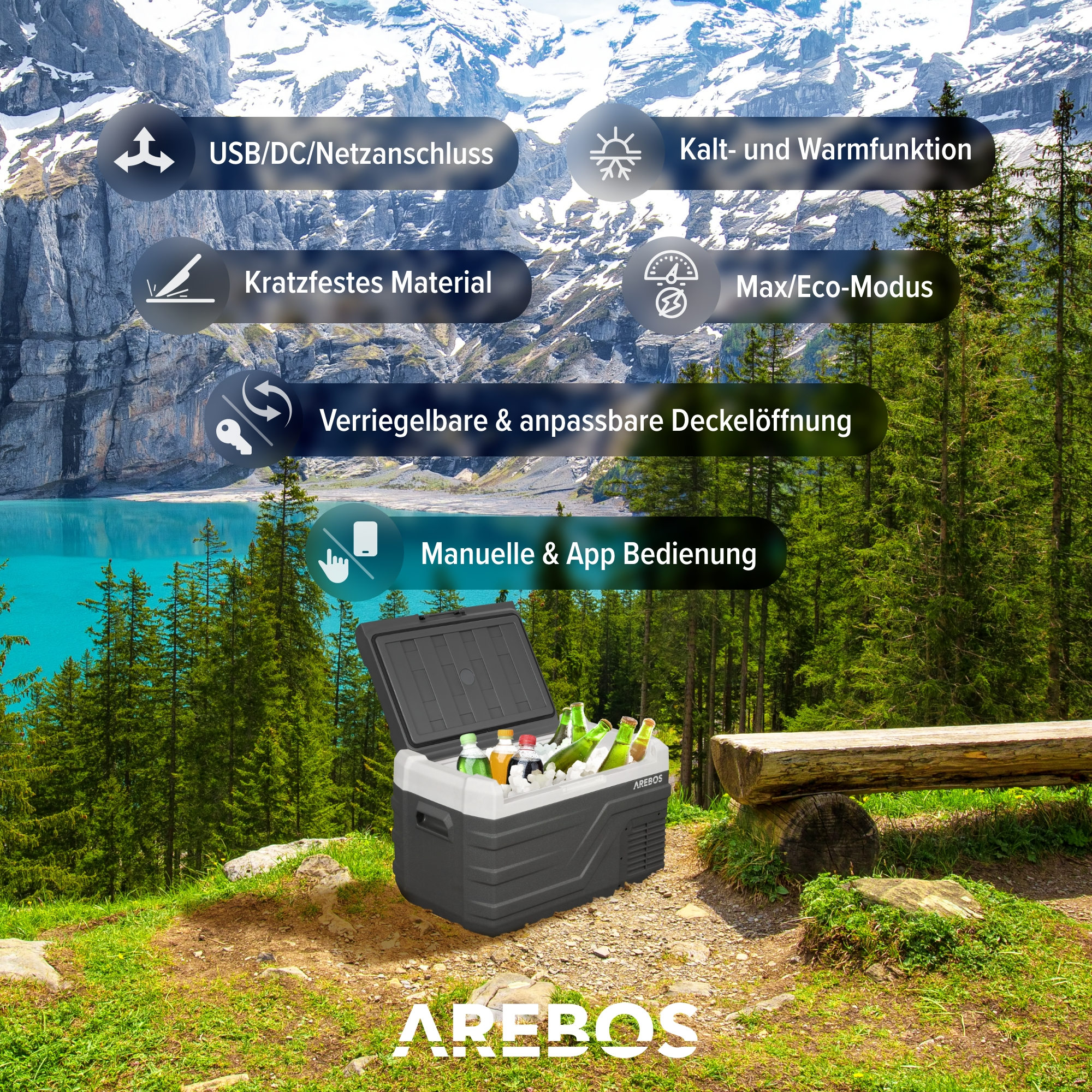 Eine Kühlbox mit Getränken, in der Nähe eines Sees. Wald und Berge im Hintergrund.