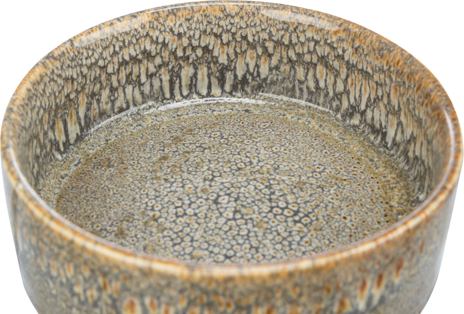 Ceramiczna miska z teksturowanym brązowo-szarym wnętrzem.