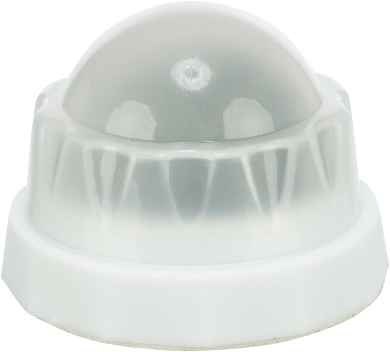 Białe i szare plastikowe urządzenie z zaokrągloną kopułą. Kopuła wydaje się przezroczysta.