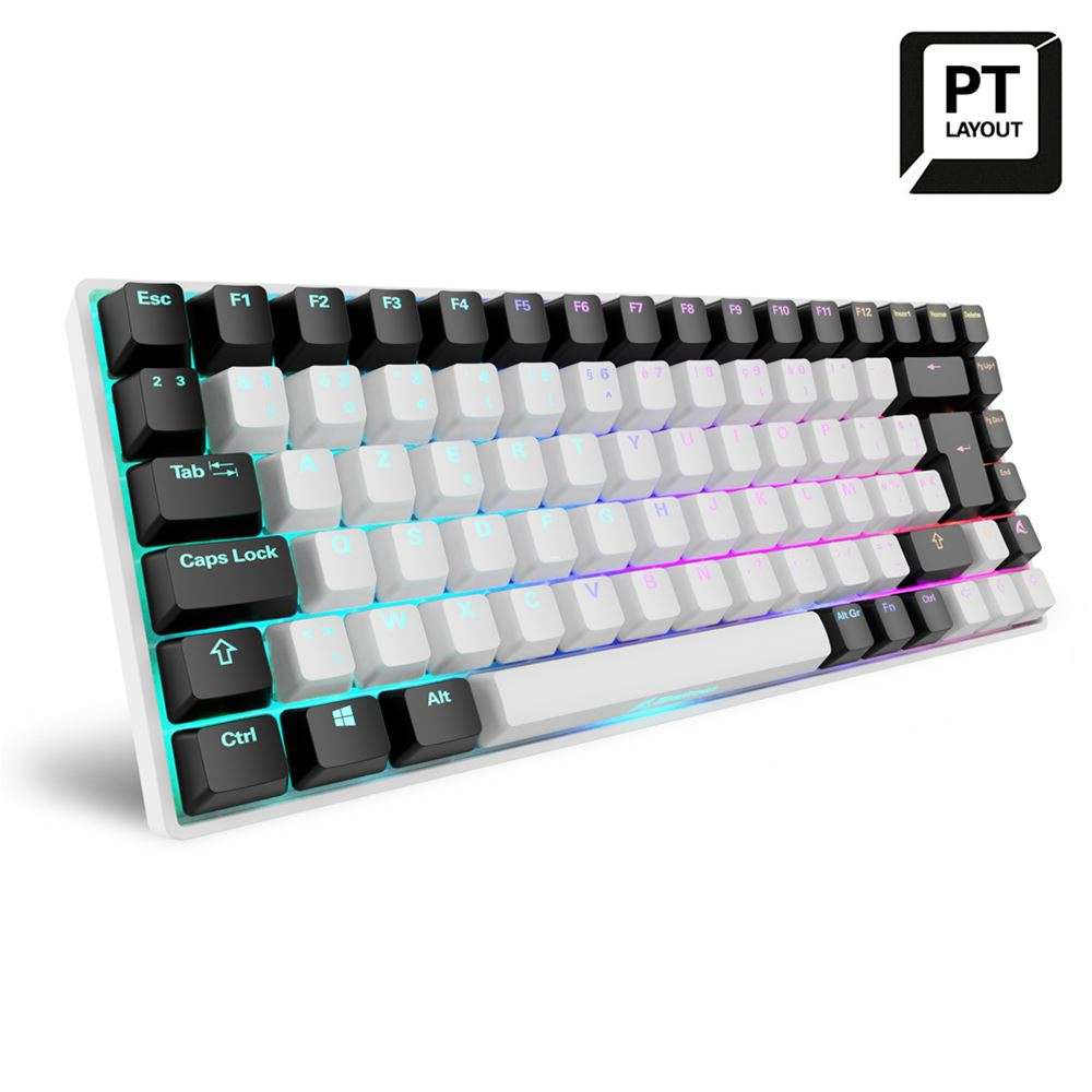 Teclado blanco y negro con teclas. Etiqueta de diseño PT en la esquina.