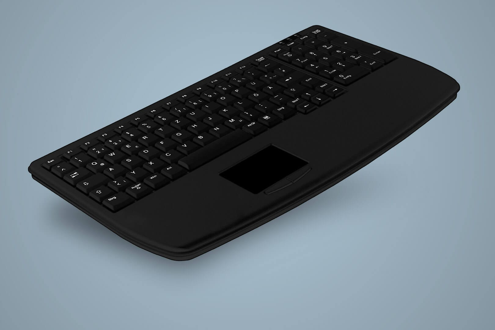 Tastiera nera con trackpad integrato, vista angolata, su sfondo blu sfumato.