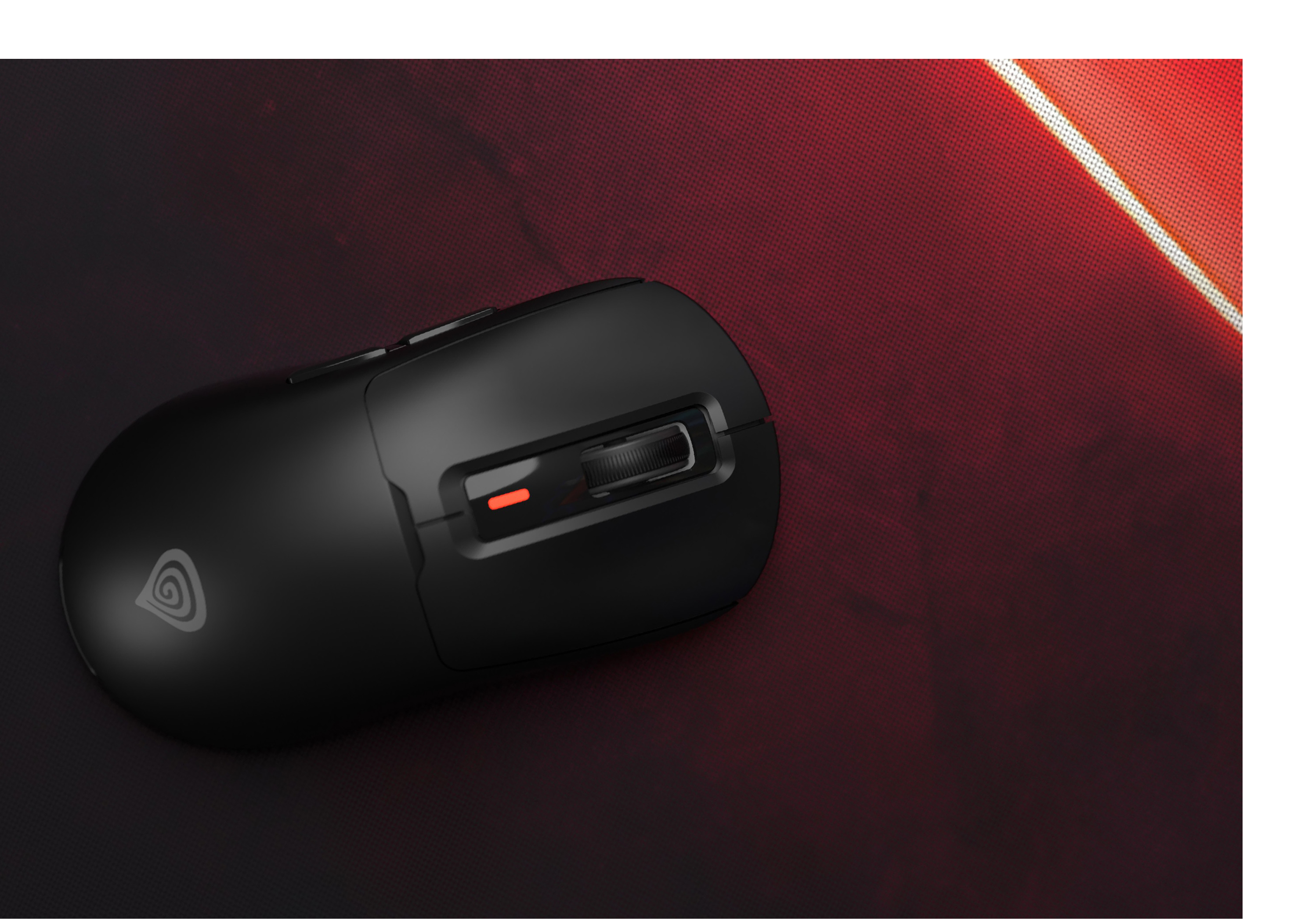 Schwarze Computermaus auf roter und schwarzer Oberfläche. Maus hat ein Scrollrad.