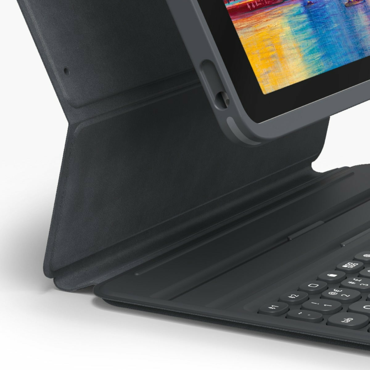 Black tablet in a case, with a keyboard attached. White background.