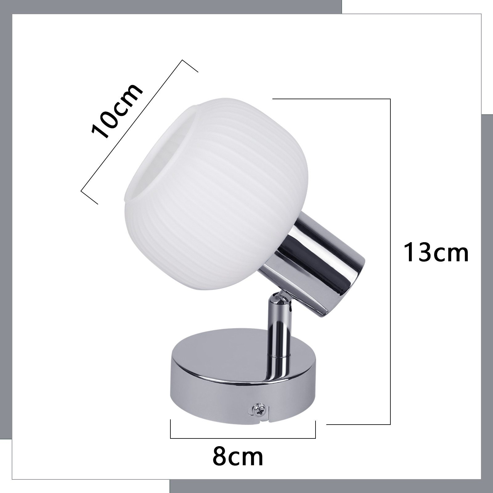 Biała, cylindryczna lampa z chromowaną podstawą. Wymiary: 10cm x 8cm x 13cm.