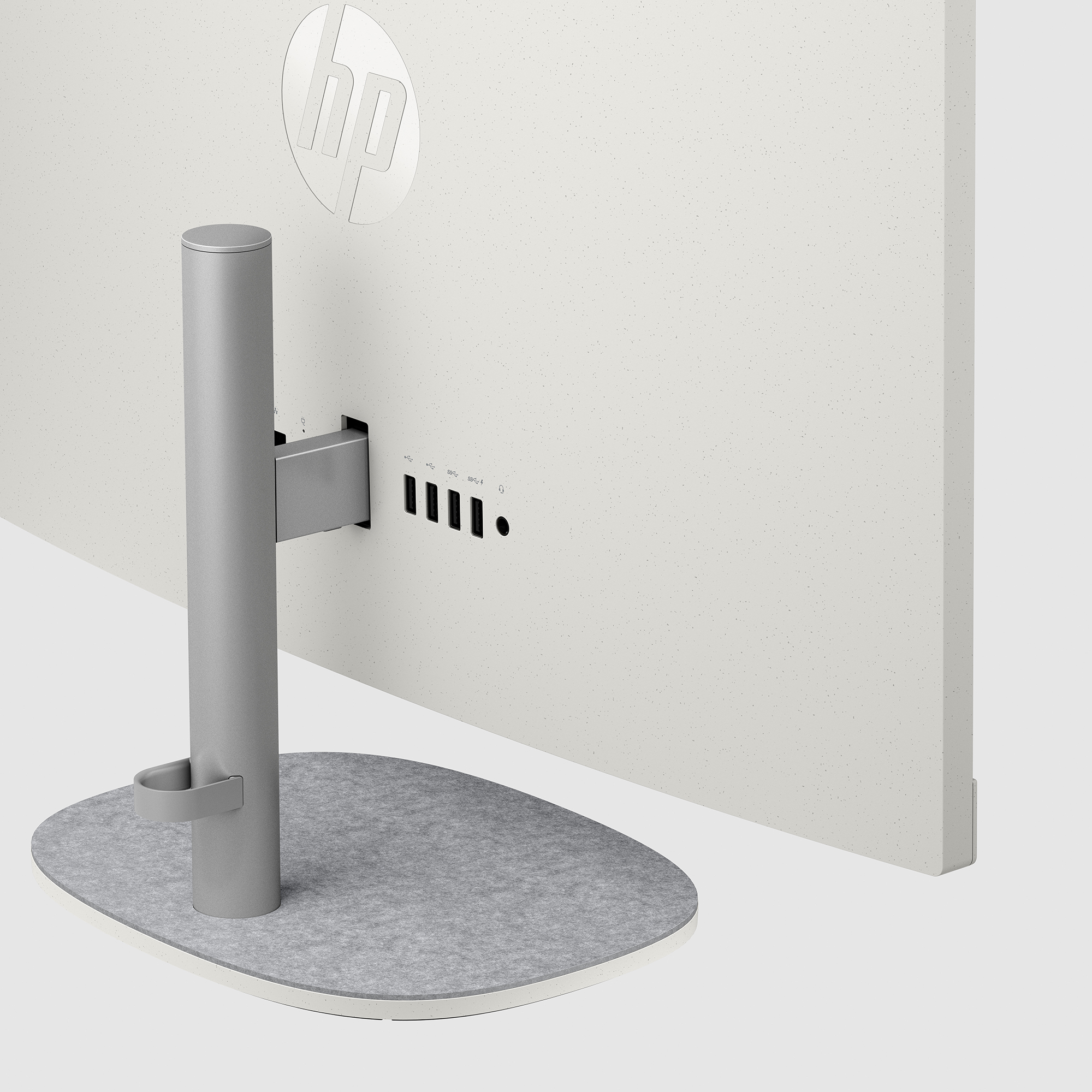 Zbliżenie tylnej części białego komputera HP all-in-one z portami.