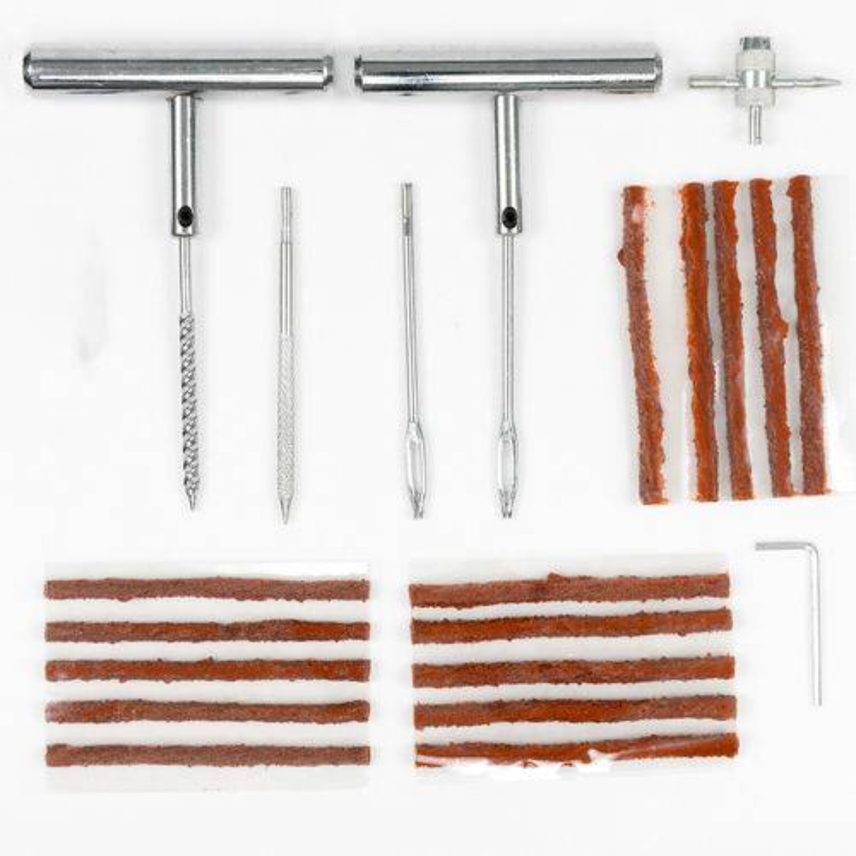 Reifenreparatur-Set mit Werkzeugen und Flicken. Enthält T-Griffe, Nadeln und Gummistreifen.