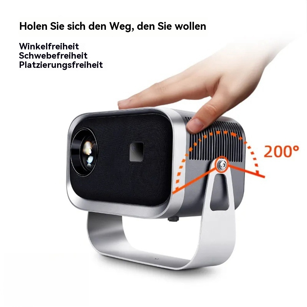 Eine Hand zeigt auf einen tragbaren Projektor. Der Projektor ist schwarz und silber mit weißem Ständer.