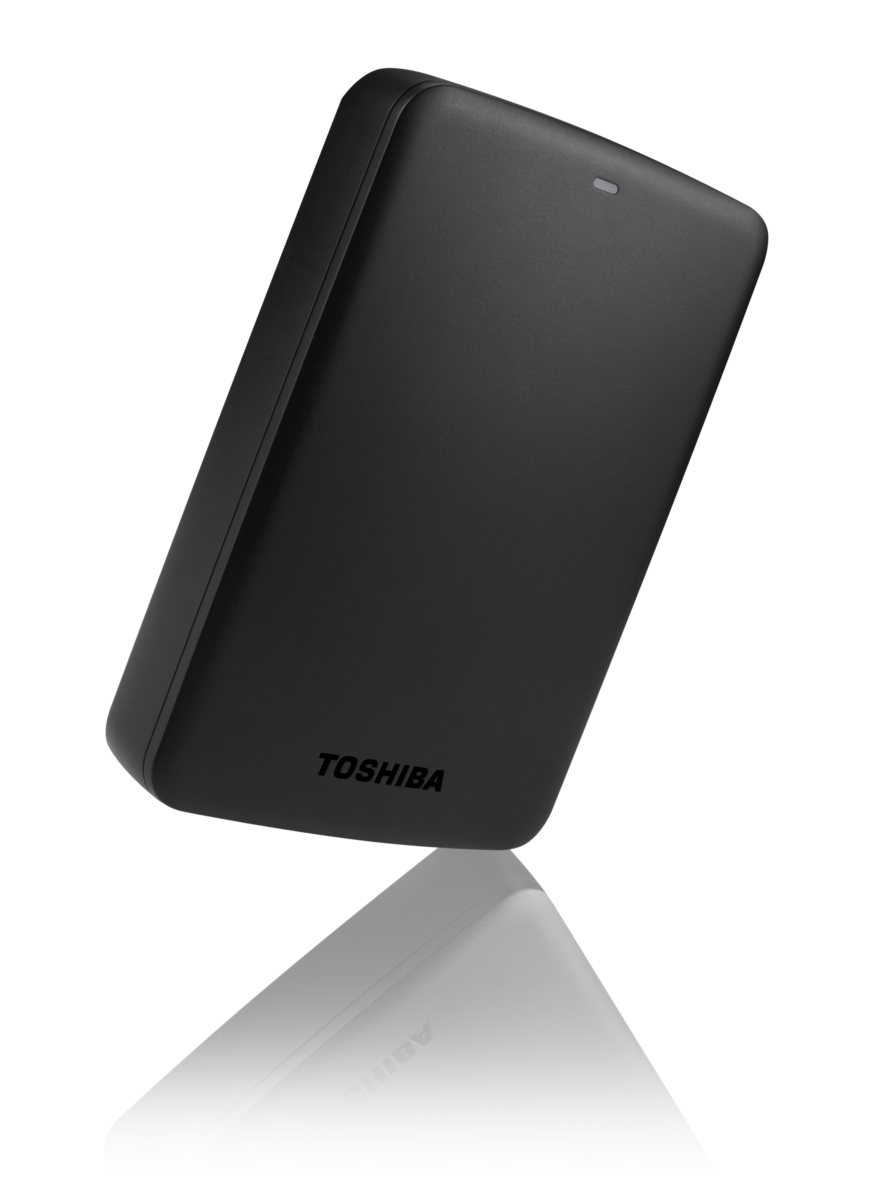 Disco duro externo rectangular negro. La marca TOSHIBA es visible.