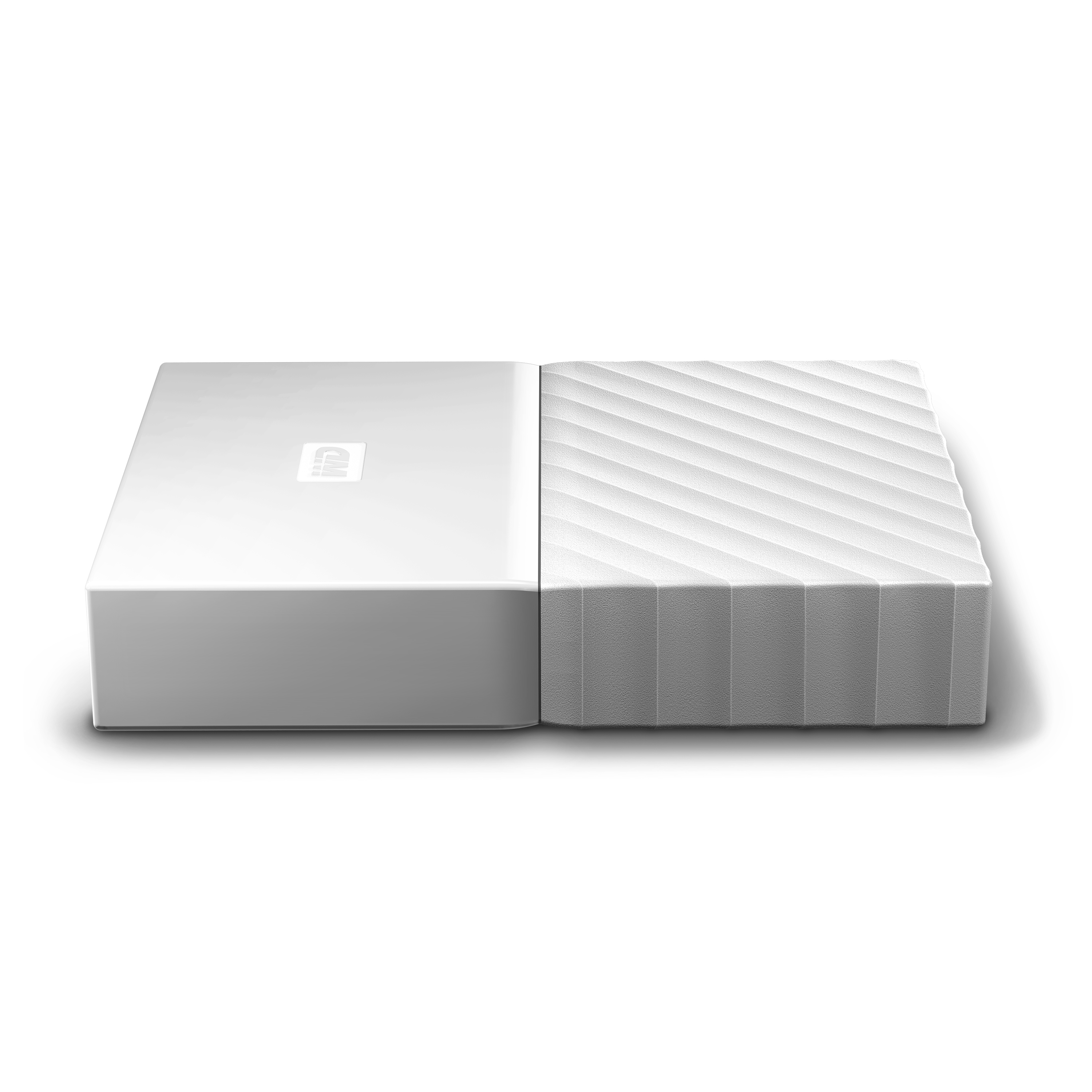 Dwuczęściowy biały zewnętrzny dysk twardy, gładki i teksturowany. Etykieta Western Digital.