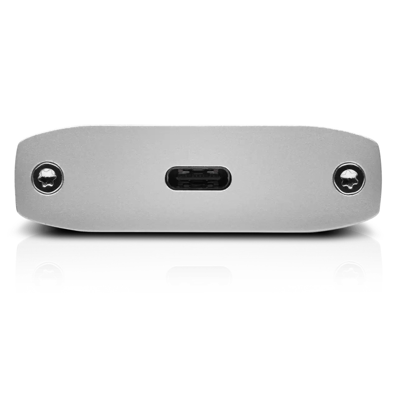 Srebrny spód urządzenia z dwiema śrubami i portem USB-C, odbijający się na białej powierzchni.