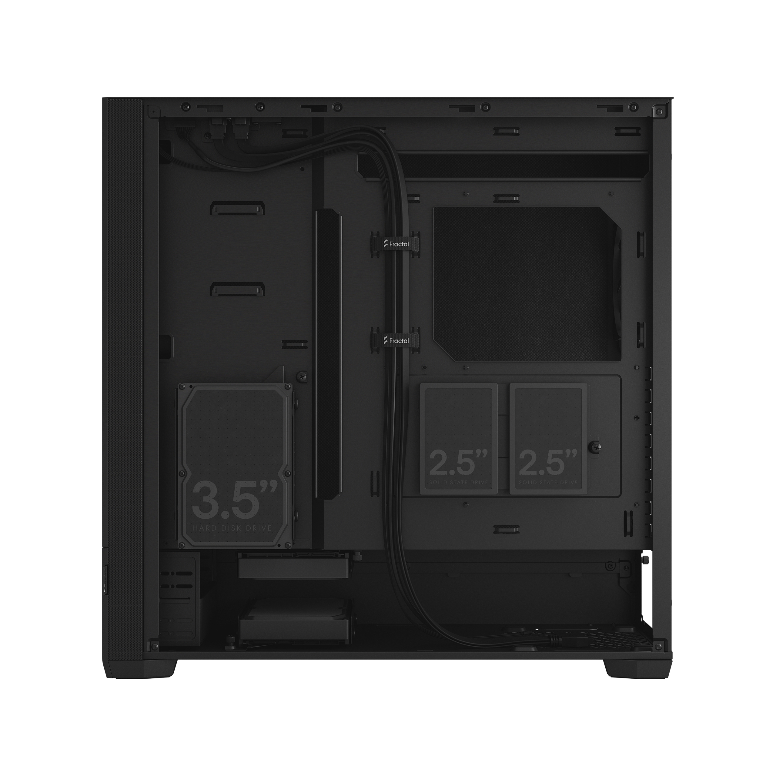 The interior of a black computer case with components. It has space for hard drives and cables.